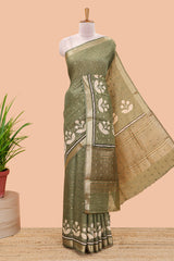Green striped assam silk saree with small zari butta, botanical block print and zari striped pallu