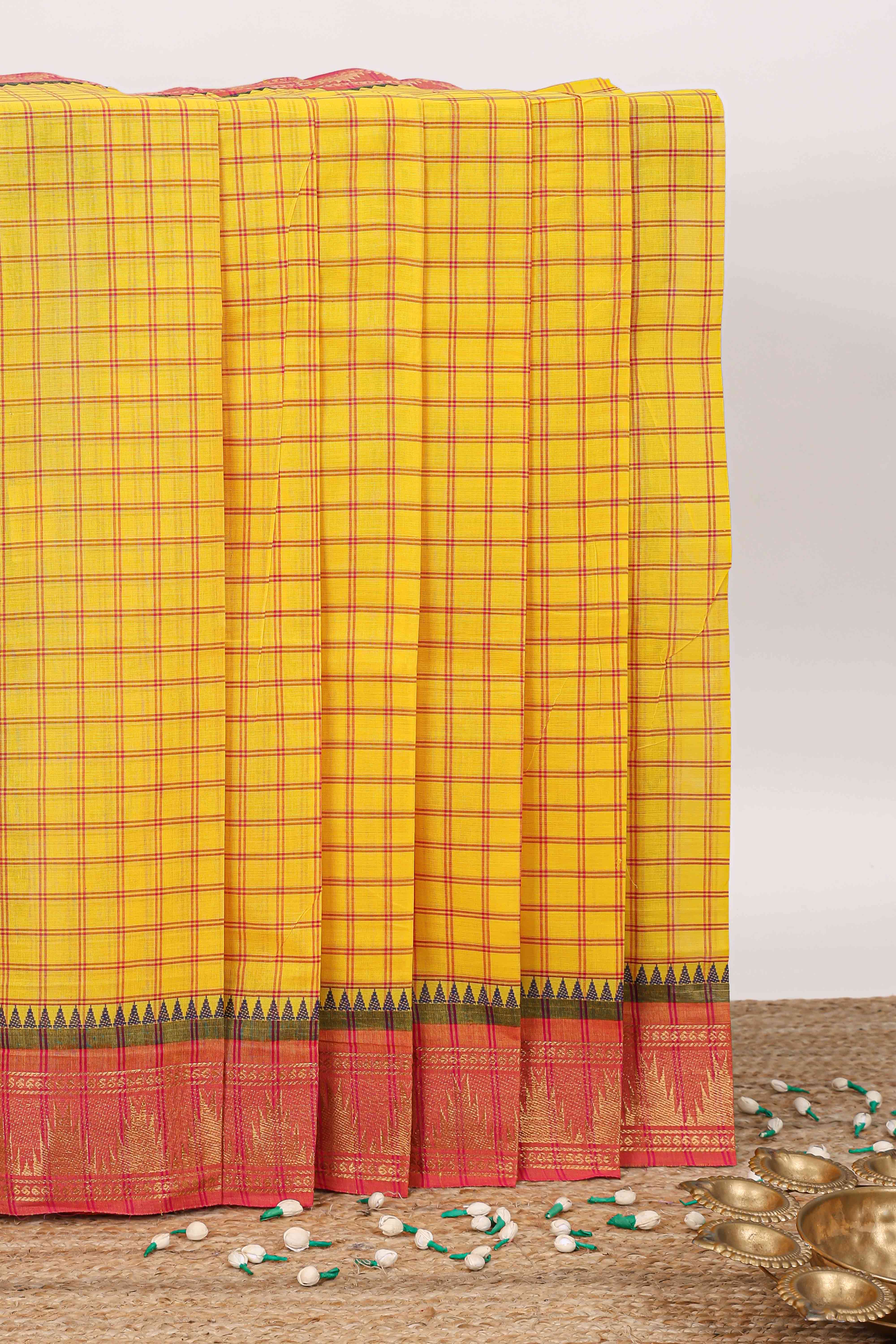 Yellow checked chettinad cotton saree with contrast zari border and stripe pallu