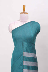 Borderless green plain south cotton saree with contrast striped pallu and matching blouse
