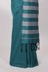 Borderless green plain south cotton saree with contrast striped pallu and matching blouse