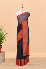 Blue jute cotton saree with contrast zari border and pallu