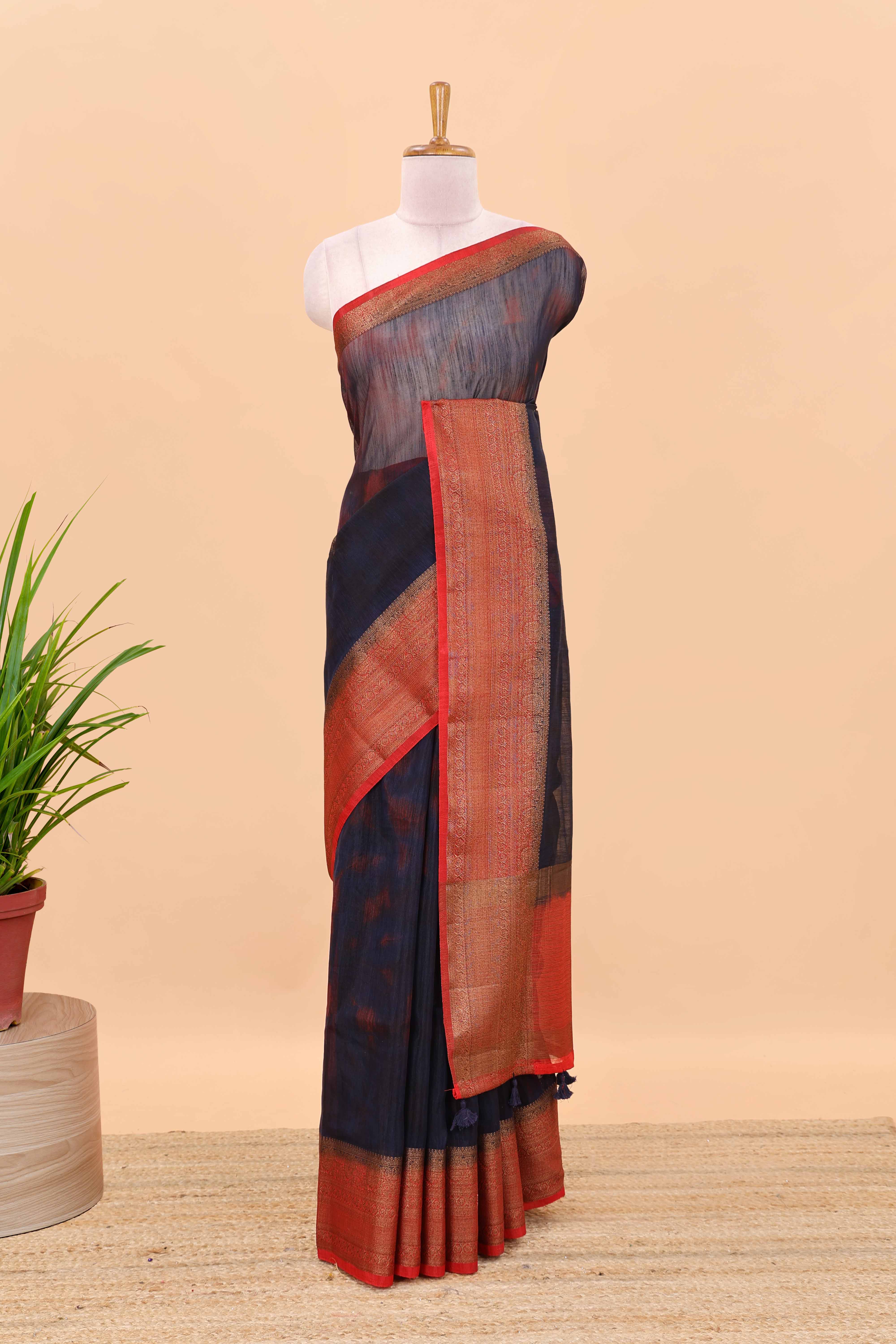 Blue jute cotton saree with contrast zari border and pallu
