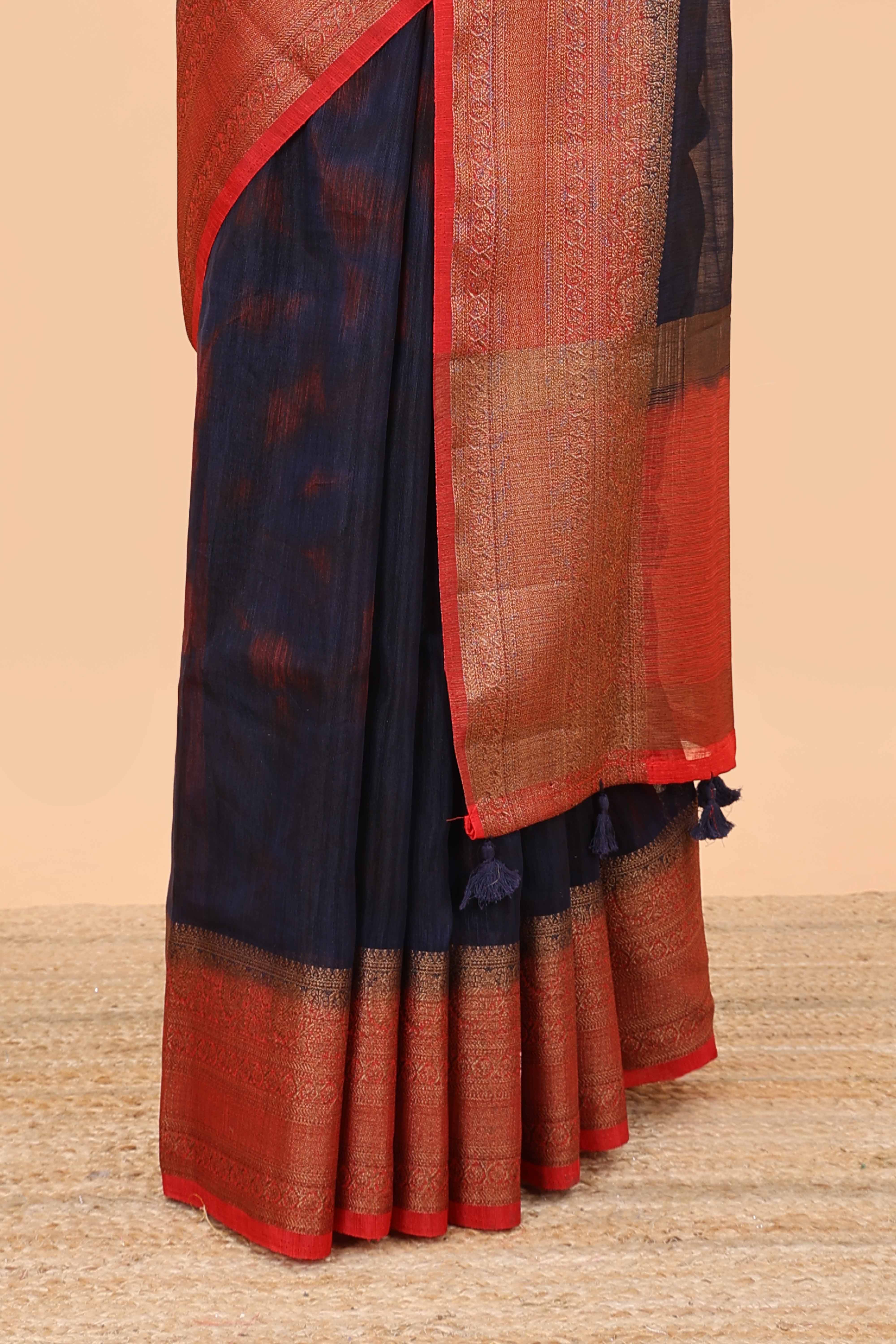 Blue jute cotton saree with contrast zari border and pallu