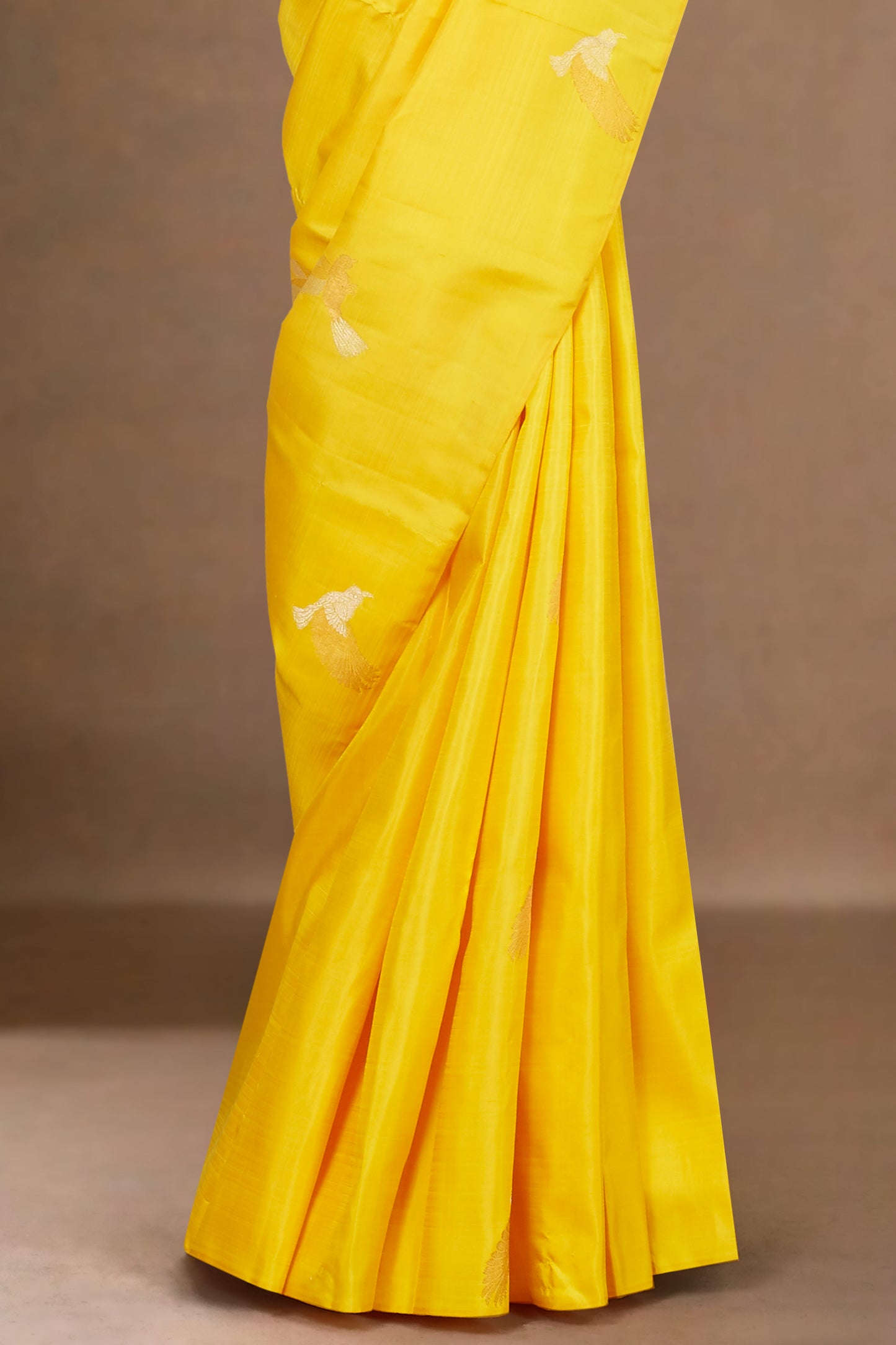 Sunshine Yellow Borderless Kanchipuram Pure Silk Saree with Silver Zari Bird Motif Buttas