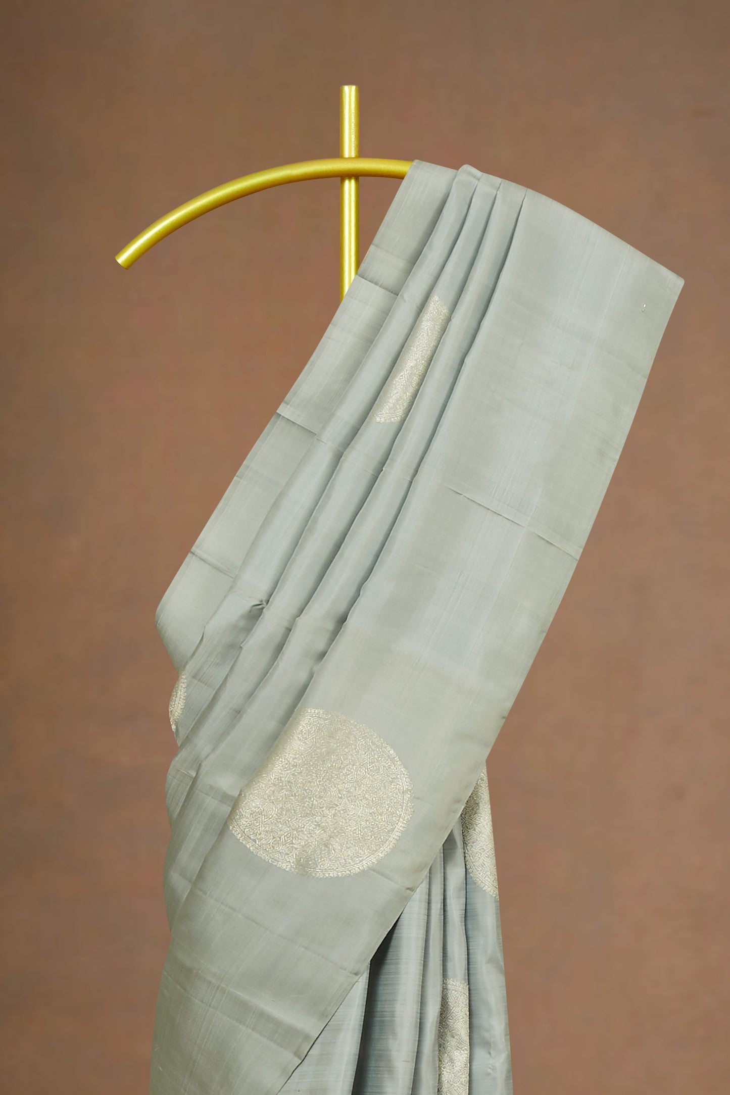 Soft Grey Kanchipuram Borderless Pure Silk Saree with Gold Round Body Buttas