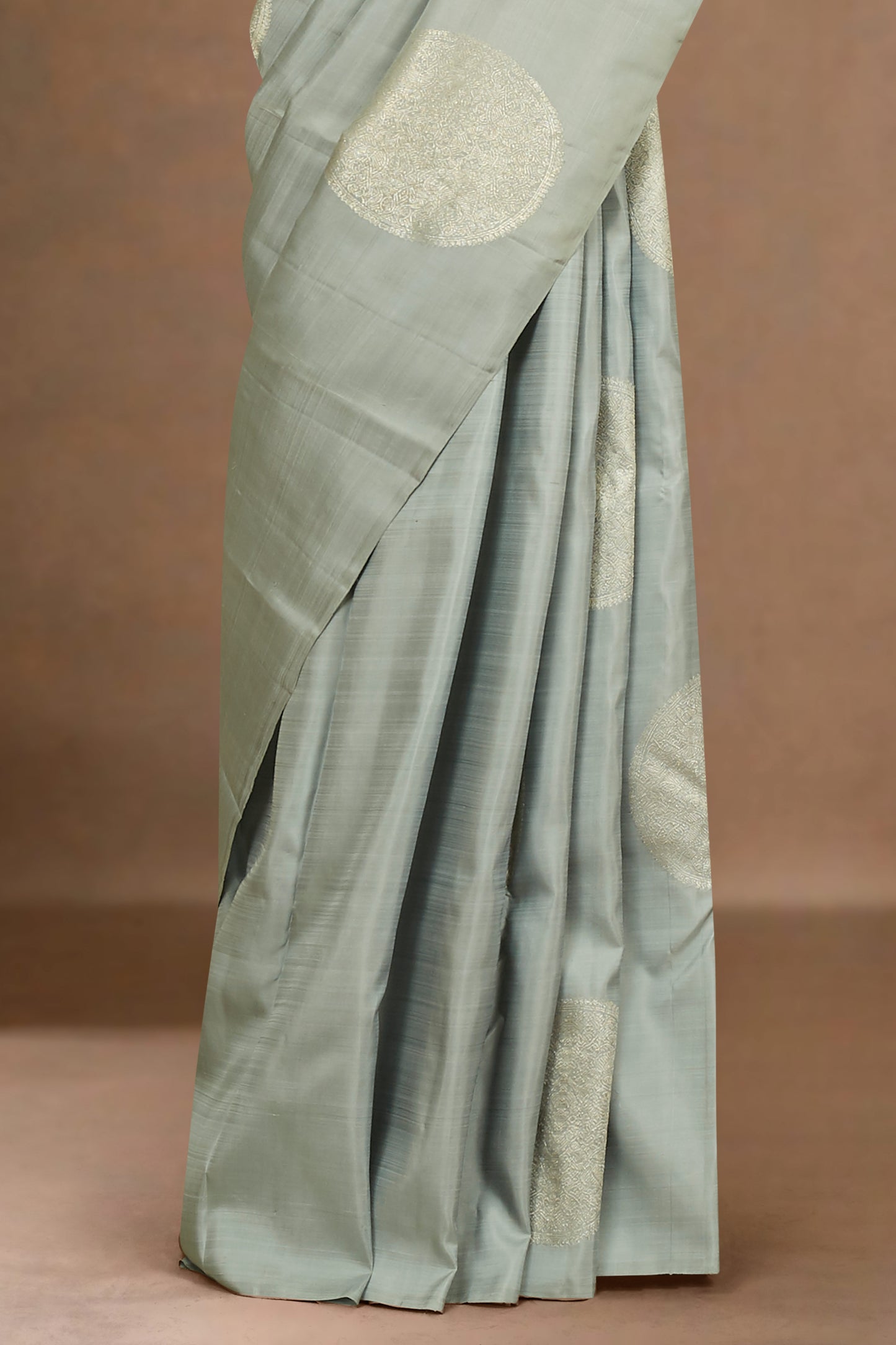 Soft Grey Kanchipuram Borderless Pure Silk Saree with Gold Round Body Buttas