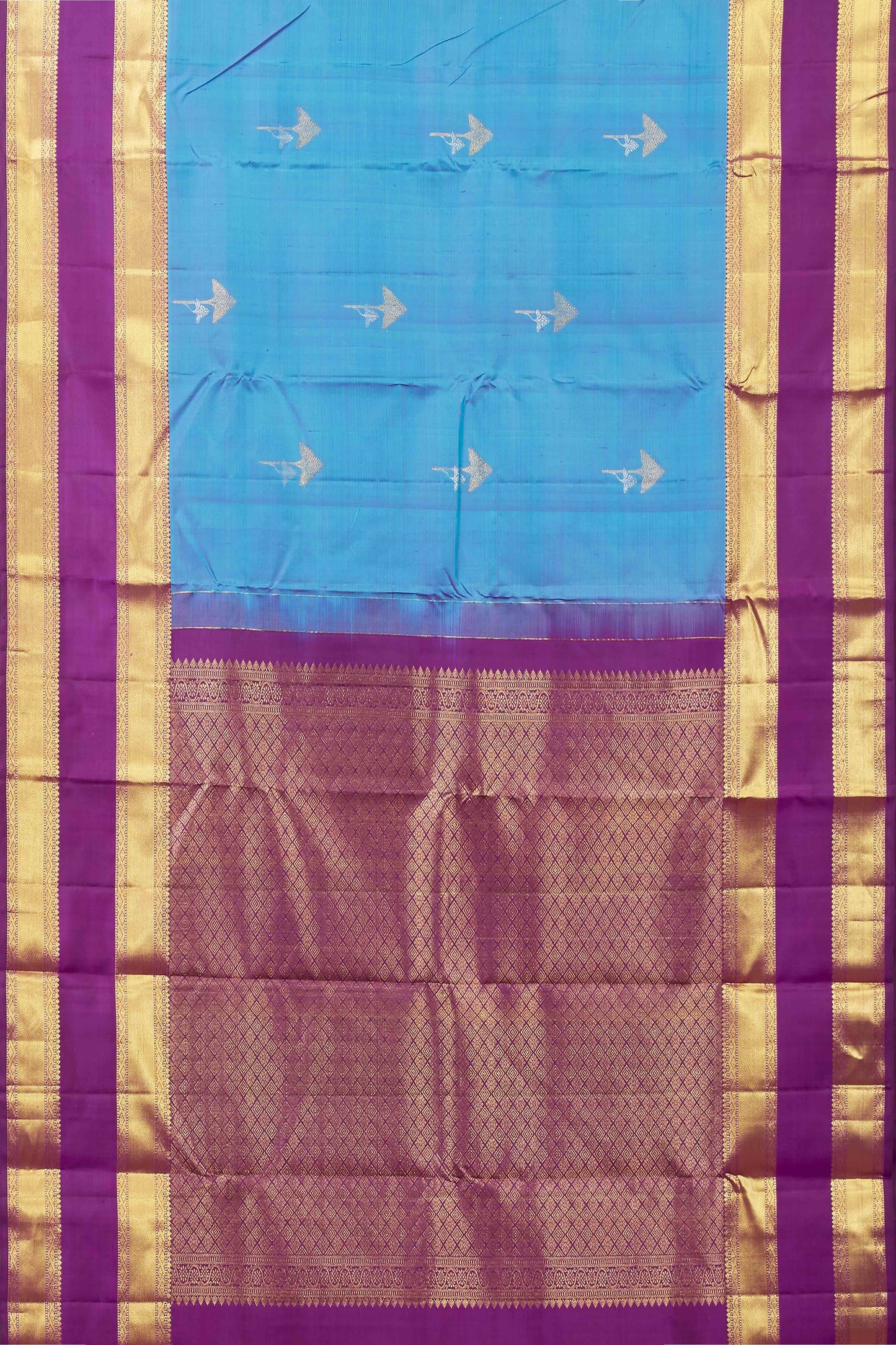Kanchipuram Pure Silk Saree in Bright Sky Blue with Small Zari Buttas and Contrast Royal Purple-Gold Border