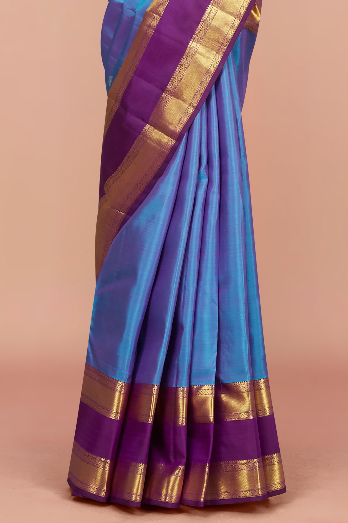 Kanchipuram Pure Silk Saree in Bright Sky Blue with Small Zari Buttas and Contrast Royal Purple-Gold Border