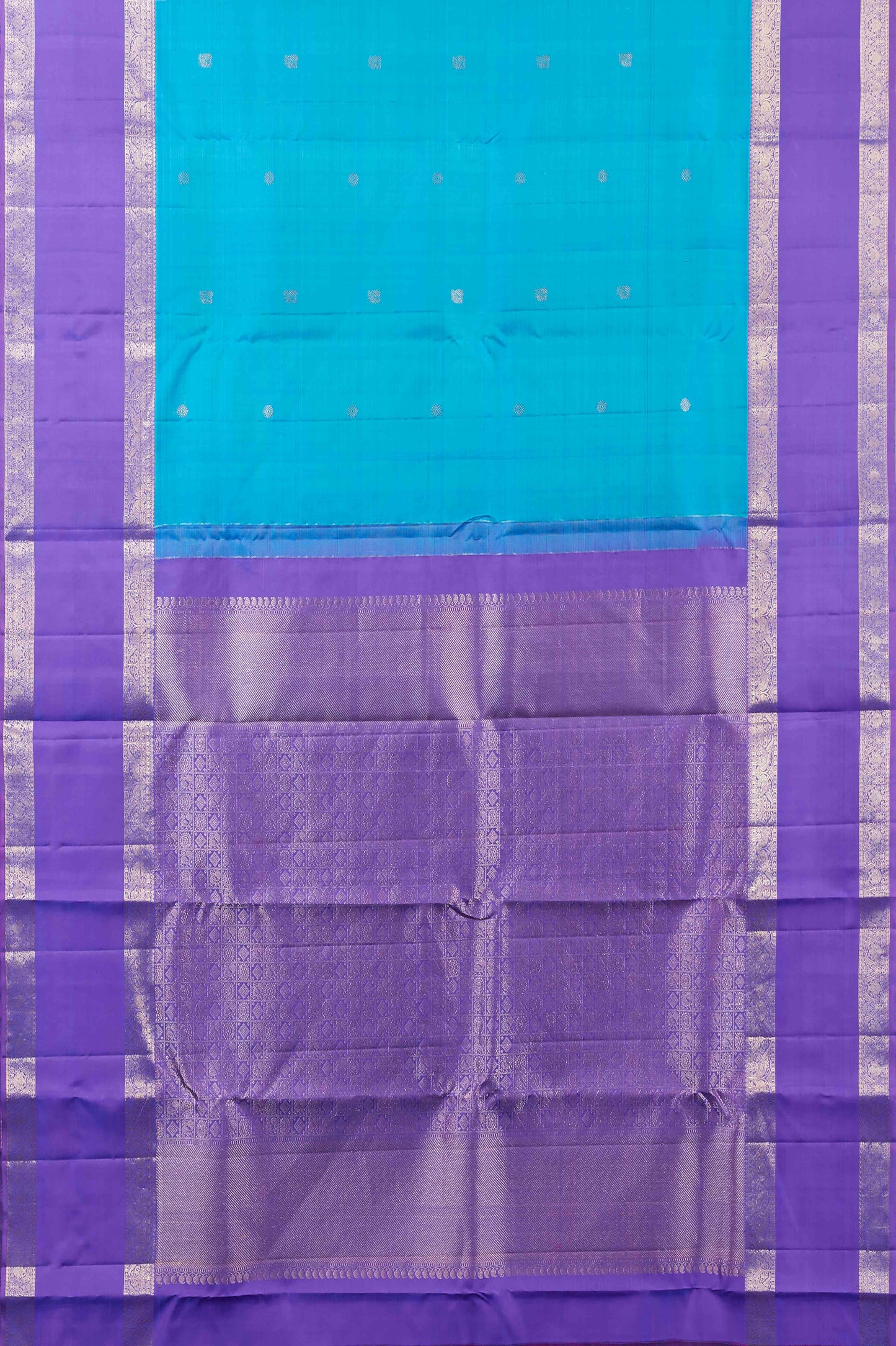 Royal Blue Kanchipuram Silk Saree with Silver Zari Detailing and Vibrant Purple Contrast Border