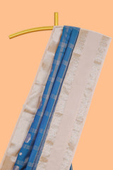 Blue checked zari butta semi soft silk saree with contrast border and pallu