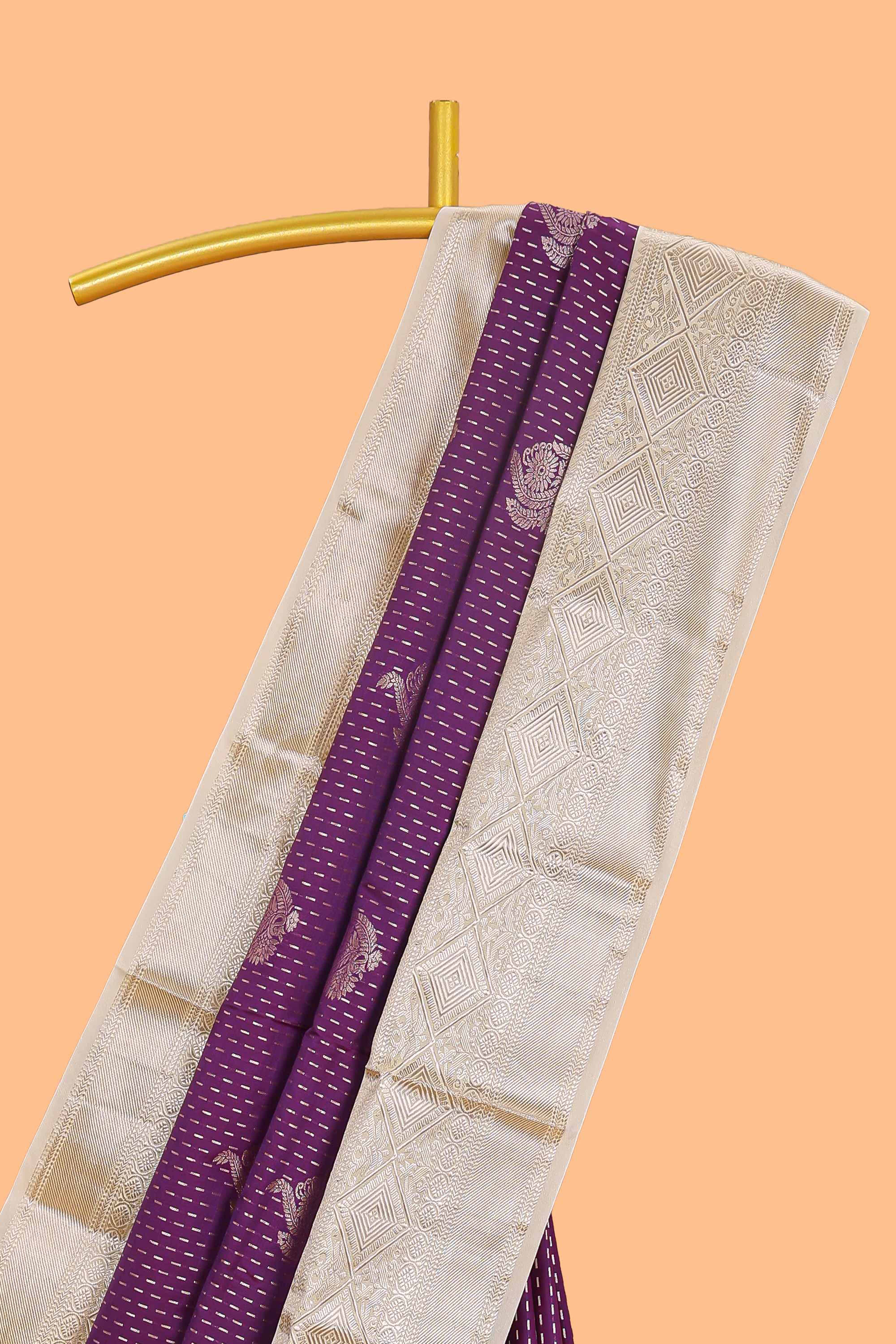 Purple zari butta design semi soft silk saree with contrast border and pallu
