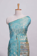 Teal green warli printed semi tussar sareewith contrast warli printed pallu and matching blouse