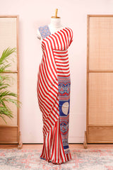 White Modal Silk Saree Body Detailing Contrast Red Vertical Stripes That Add a Sleek and Elegant Touch. The Pallu Are Highlighted Ajrakh Design Along With Blouse