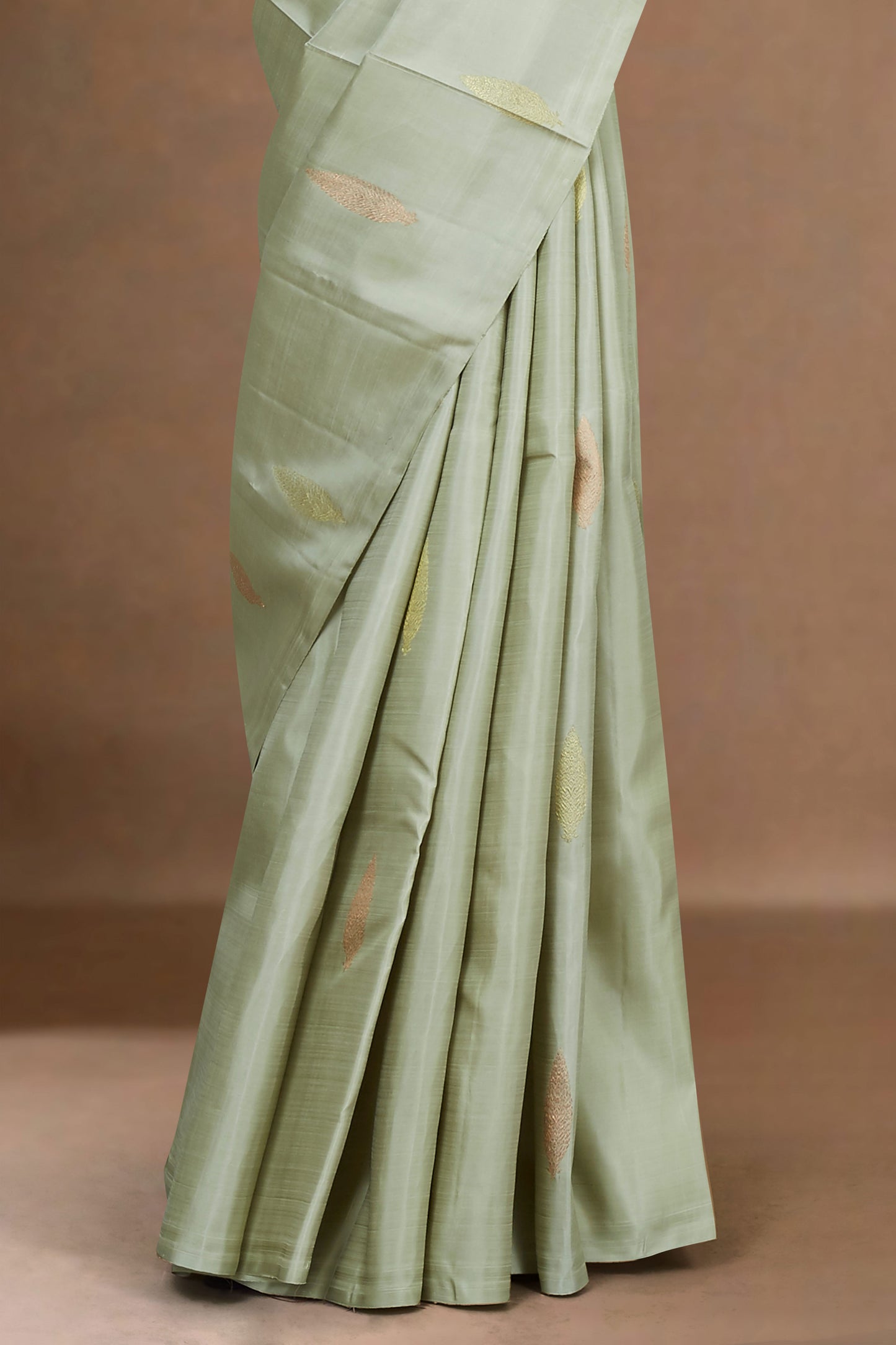 Ivory & Teal Borderless Kanchipuram Pure Silk Saree with Zari Body Buttas