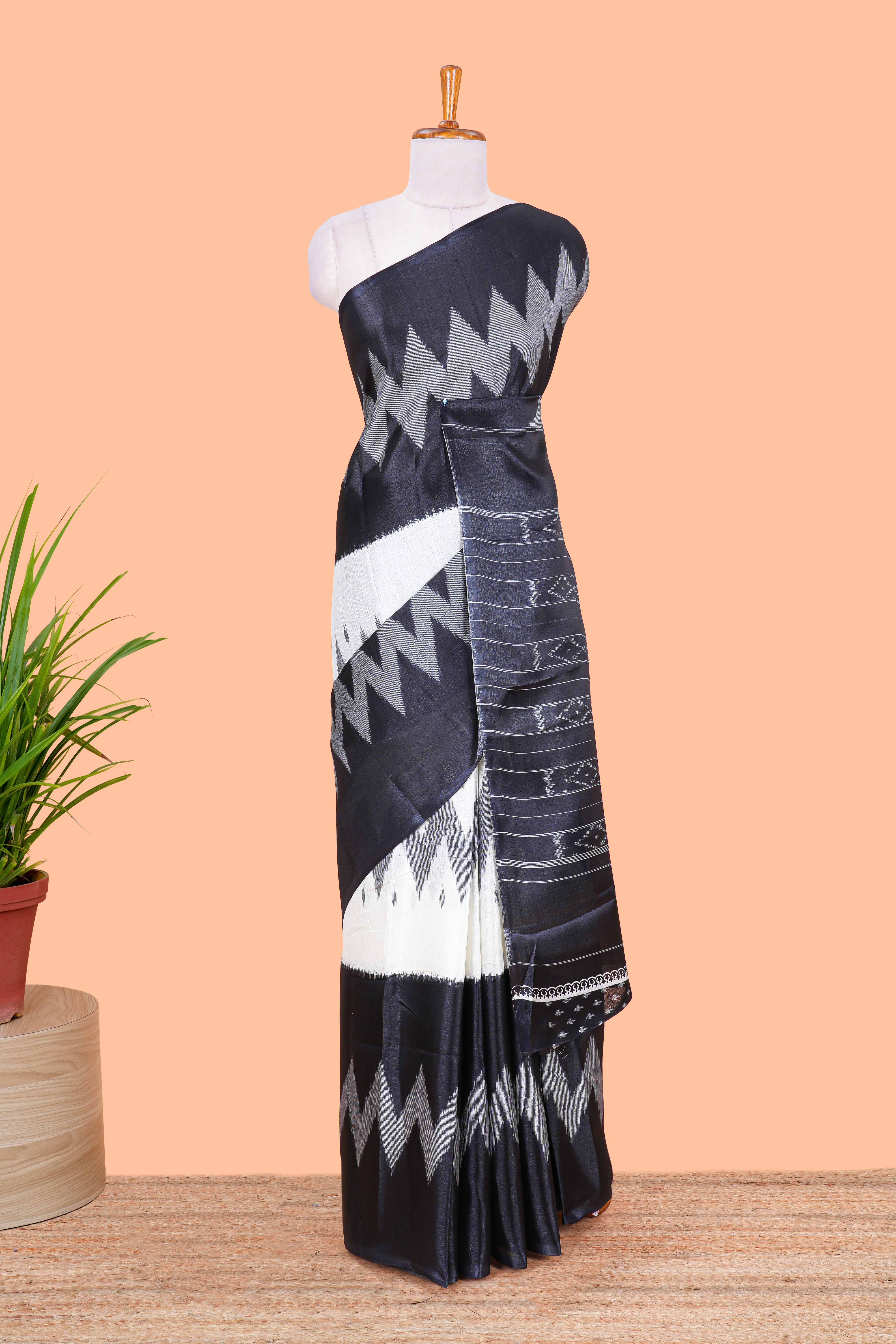 Black & white geometric ikkat style south cotton saree with striped pallu and blouse