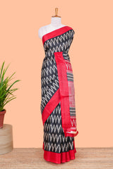 Black ikkat style chevron print south cotton saree with contrast border and blouse