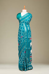 Rama Green Dola Silk Saree Jaali Design ,Pink Lotus Motifs Across The Body With Gold Zari Bentex Border Pichwai Design Pallu Along With Blouse