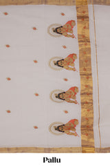 Cream peacock feather motifs design kerala cotton saree with self zari border and krishnan themed pallu