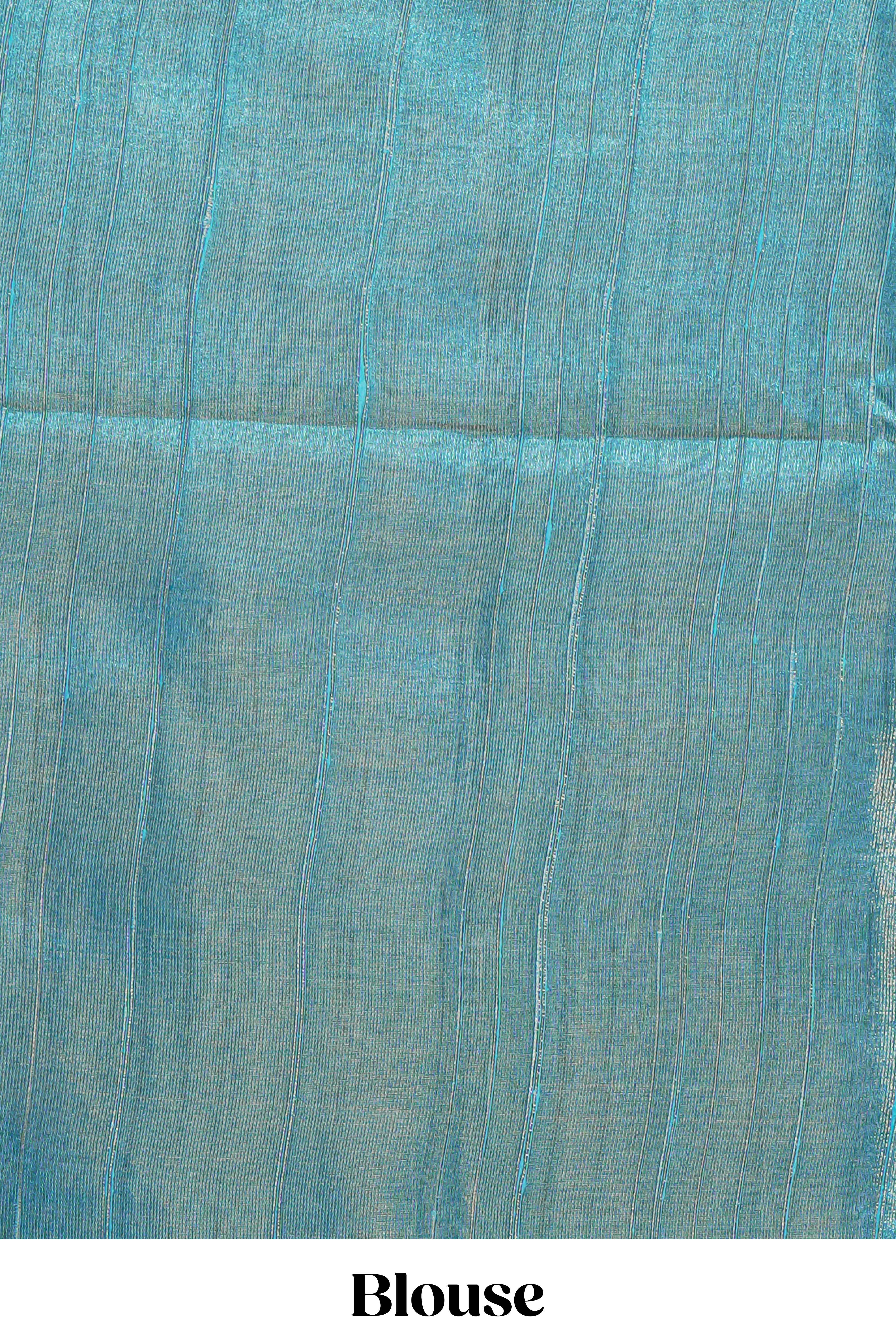 Teal green warli printed semi tussar sareewith contrast warli printed pallu and matching blouse