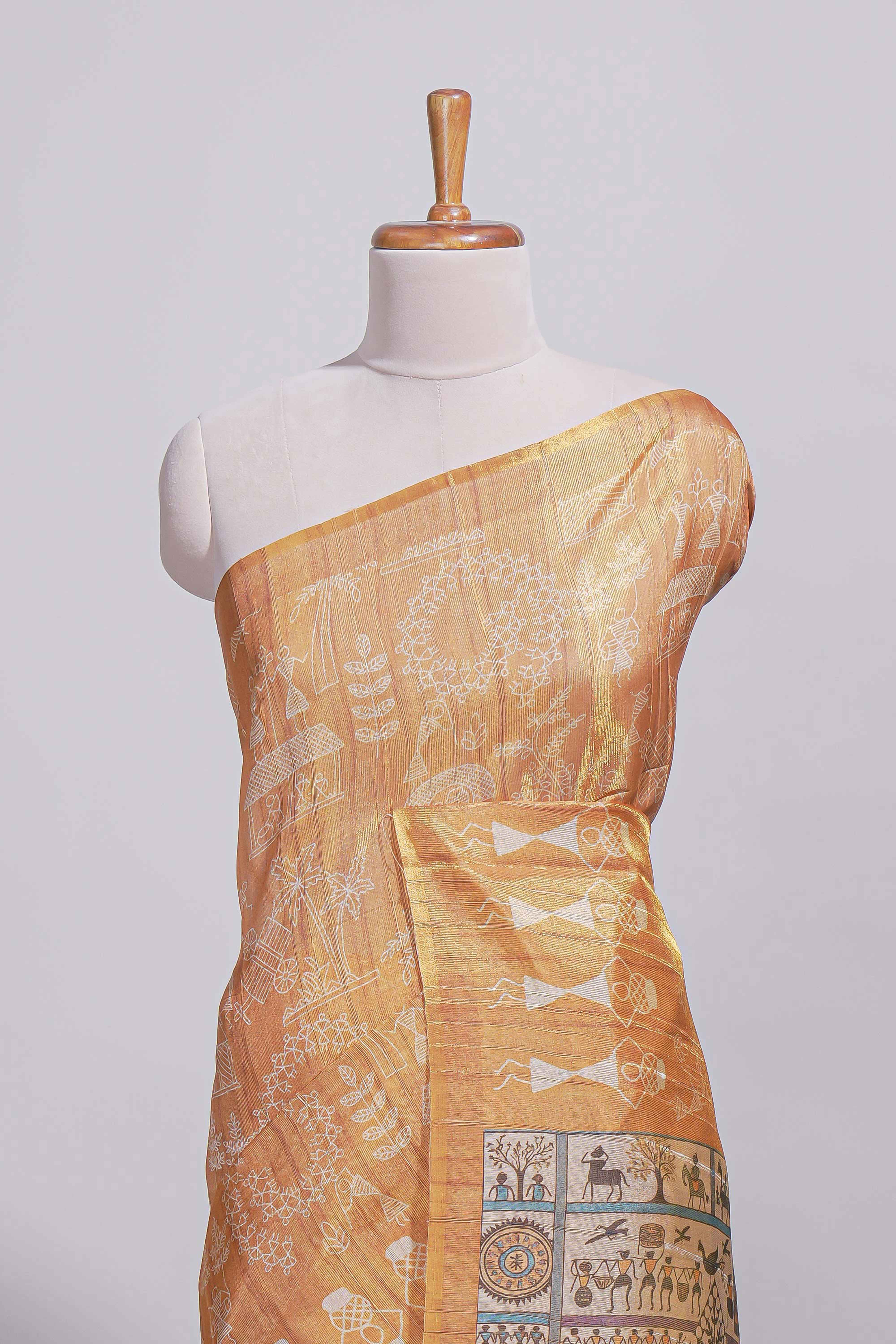 Mustard yellow warli printed semi tussar sareewith contrast warli printed pallu and matching blouse