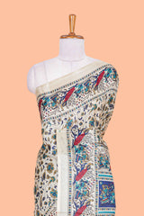Cream south cotton saree with green kalamkari print on body, pallu contrast blue blouse