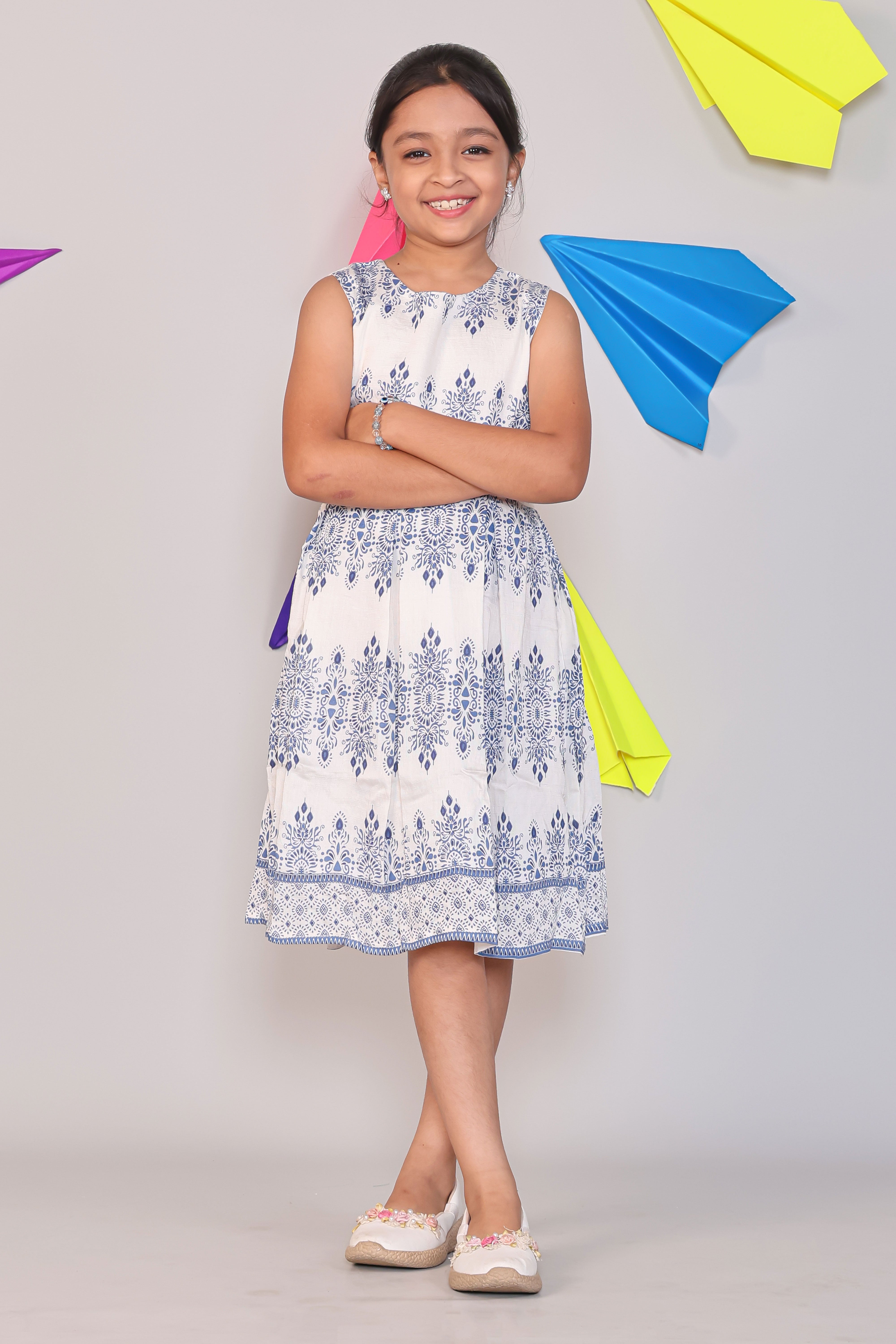 White floral design Sleeveless A-Line Cotton Frock with Detachable Navy Shrug
