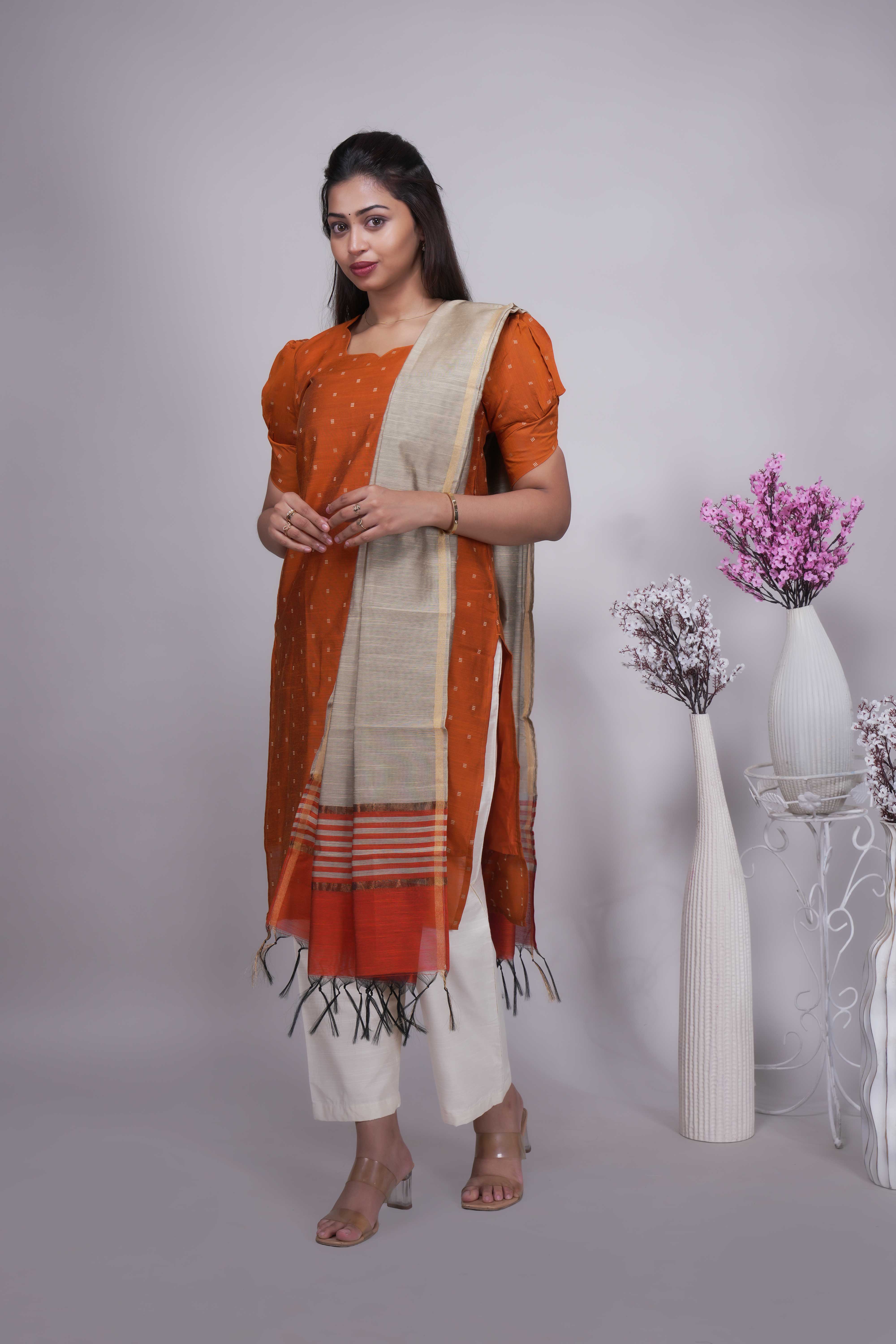 Orange Butta Straight cut salwar suit with Off-White Pants & Woven Tassel Dupatta Set