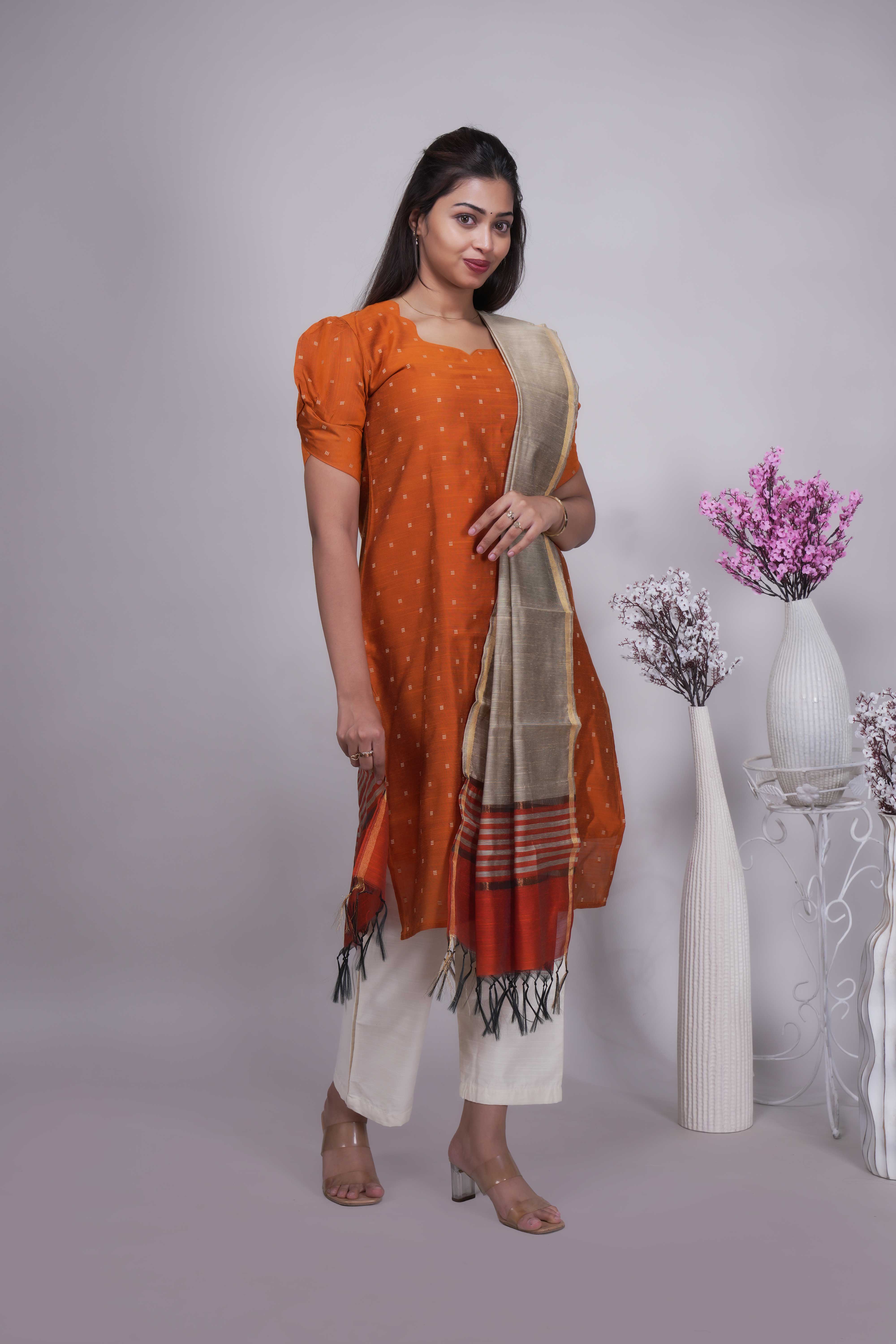 Orange Butta Straight cut salwar suit with Off-White Pants & Woven Tassel Dupatta Set