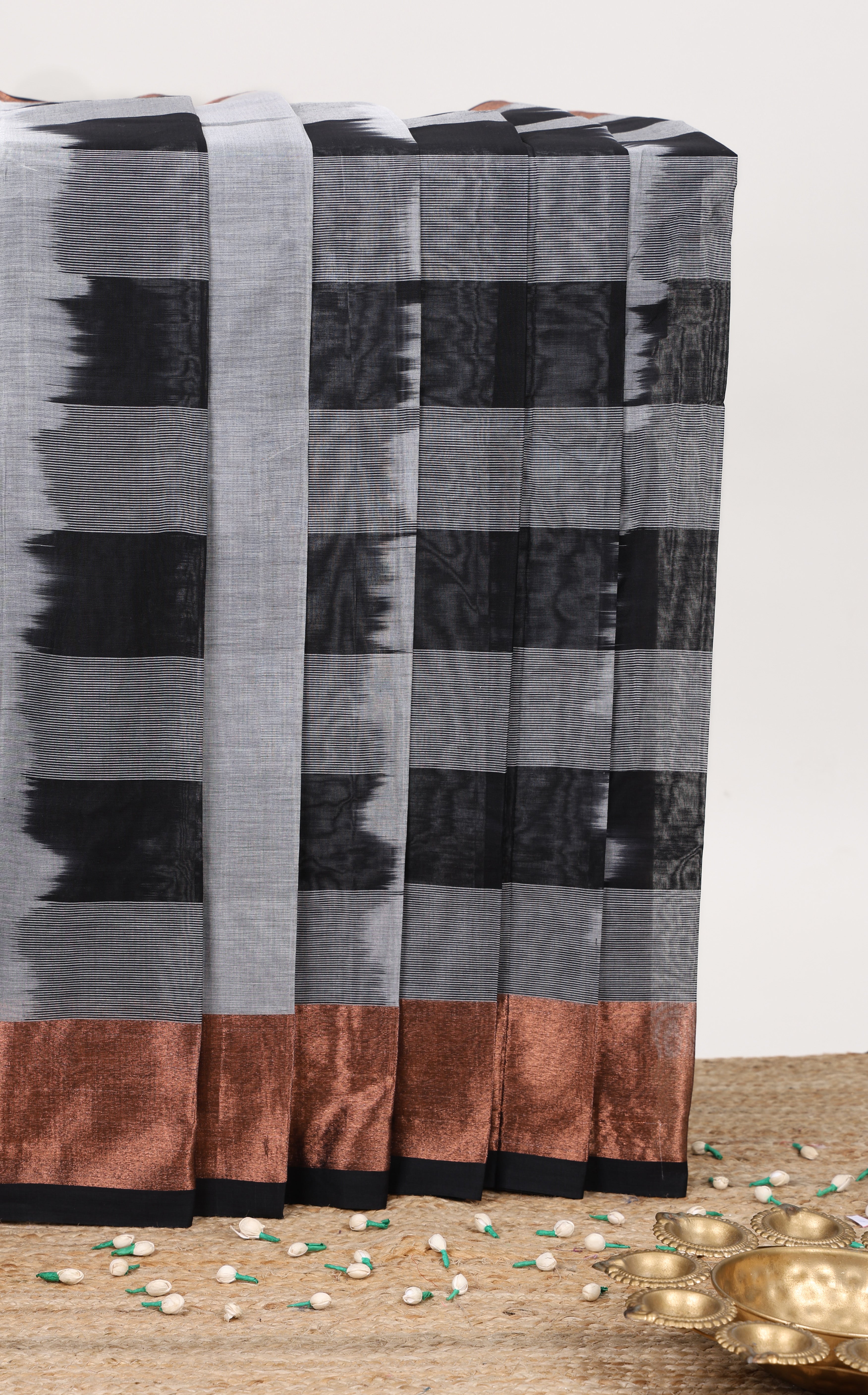Grey striped bengal cotton saree with copper zari border and pallu