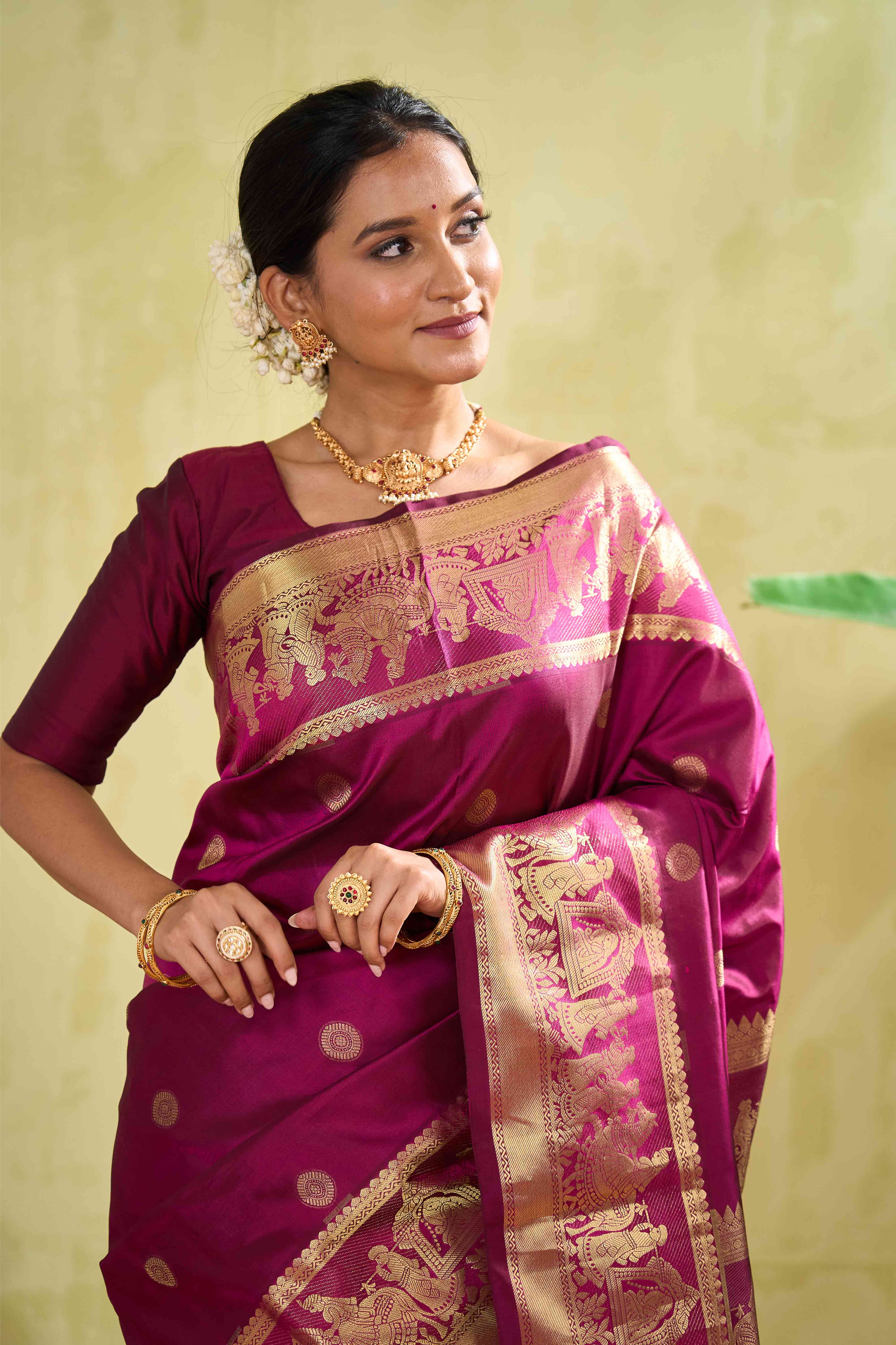 Kanchipuram Traditional Silk Saree in Magenta with Gold Zari Buttas & Self Border