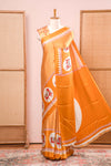 Vibrant Yellow Modal Silk Saree The Body Has Fine Vertical White Stripes The Border Are Highlighted Pichwai Design Along With Ajrakh Printed Blouse