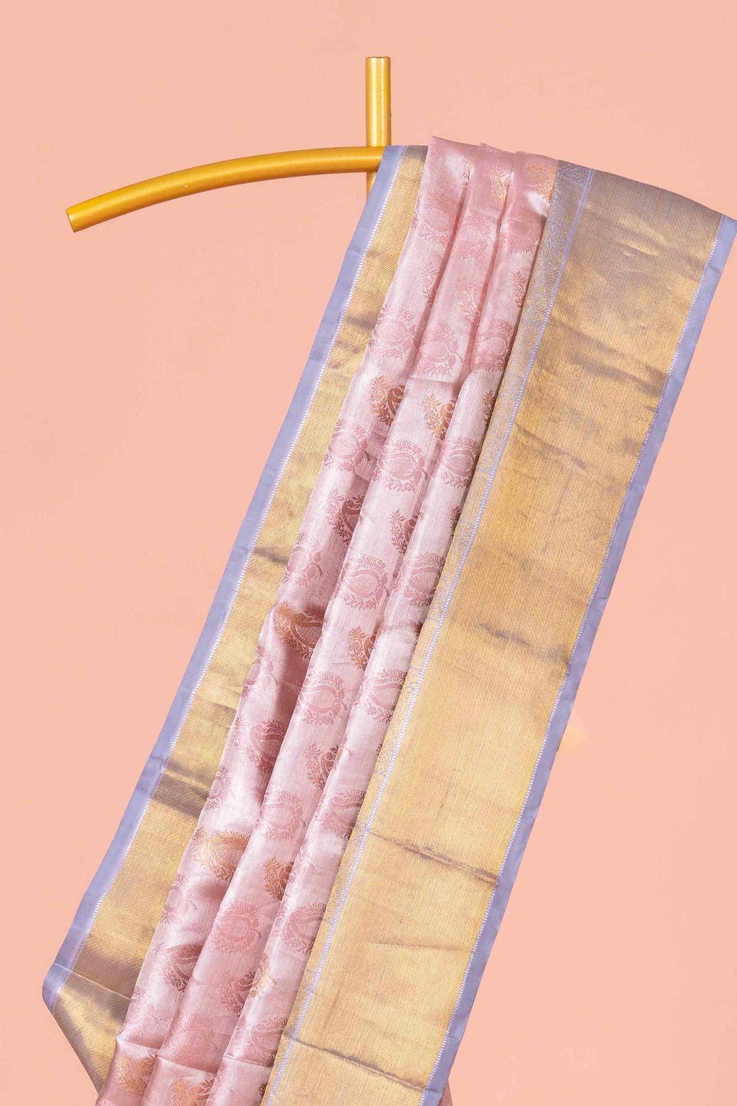 Pastel Pink Tissue Kancheepuram Pattu With Silver Zari Border And Elegant Pallu Design