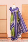 Green Semi Art Silk Saree Delicate Golden Zari Motifs Along With Thalampoo Zari Woven Across The Body. The Border Is Broad With Intricate Floral Zari Weaving Rich Golden Zari Pallu