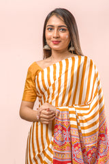 Modal Silk Sareehe Body Has Contrast Vibrant Yellow Vertical Stripes The Pallu Are Highlighted Ajrakh Design Along With Blouse