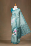 Teal Blue Art Tussar Saree Centre Floral Print Across The Body With Zari Stripes Pallu