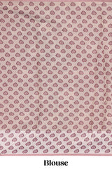 Pink polka motifs design art tissue saree with contrast floral design border and matching motifs blouse