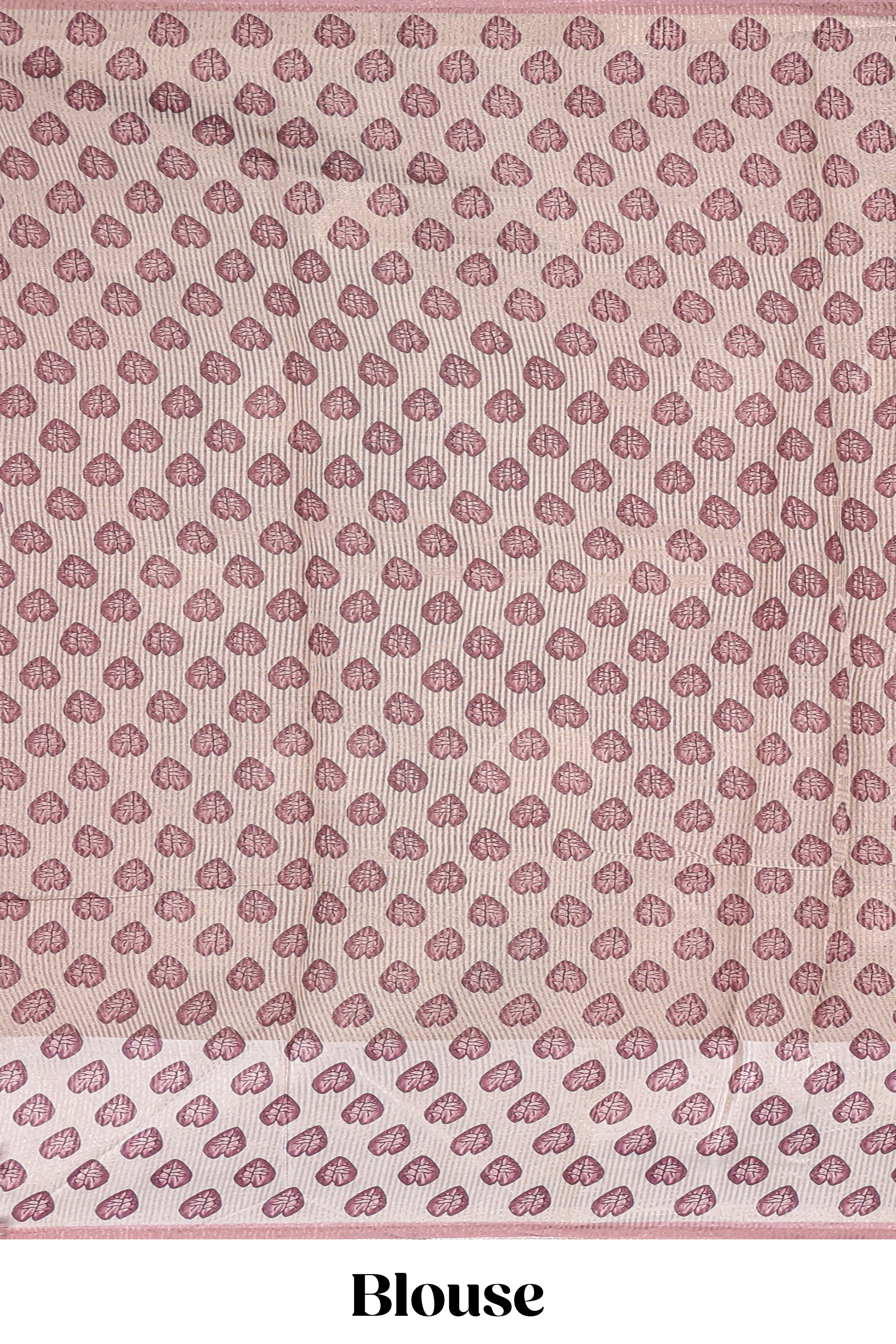 Pink polka motifs design art tissue saree with contrast floral design border and matching motifs blouse