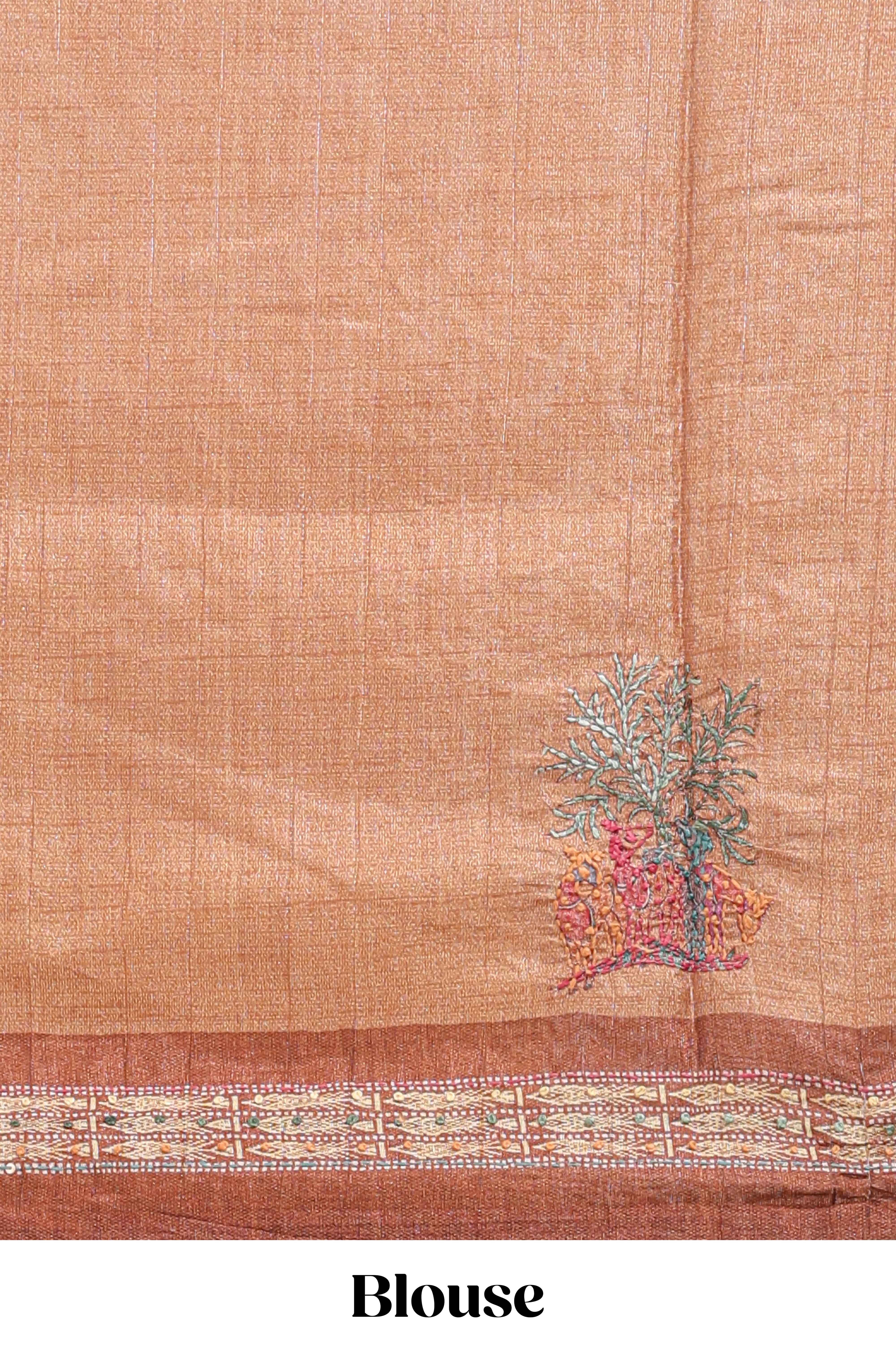 Tussar saree in beige tone delicate floral embroidery featuring rust-brown borders and woven pallu along with contrast blouse