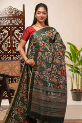 Green floral design tussar saree with self zari border and matching blouse