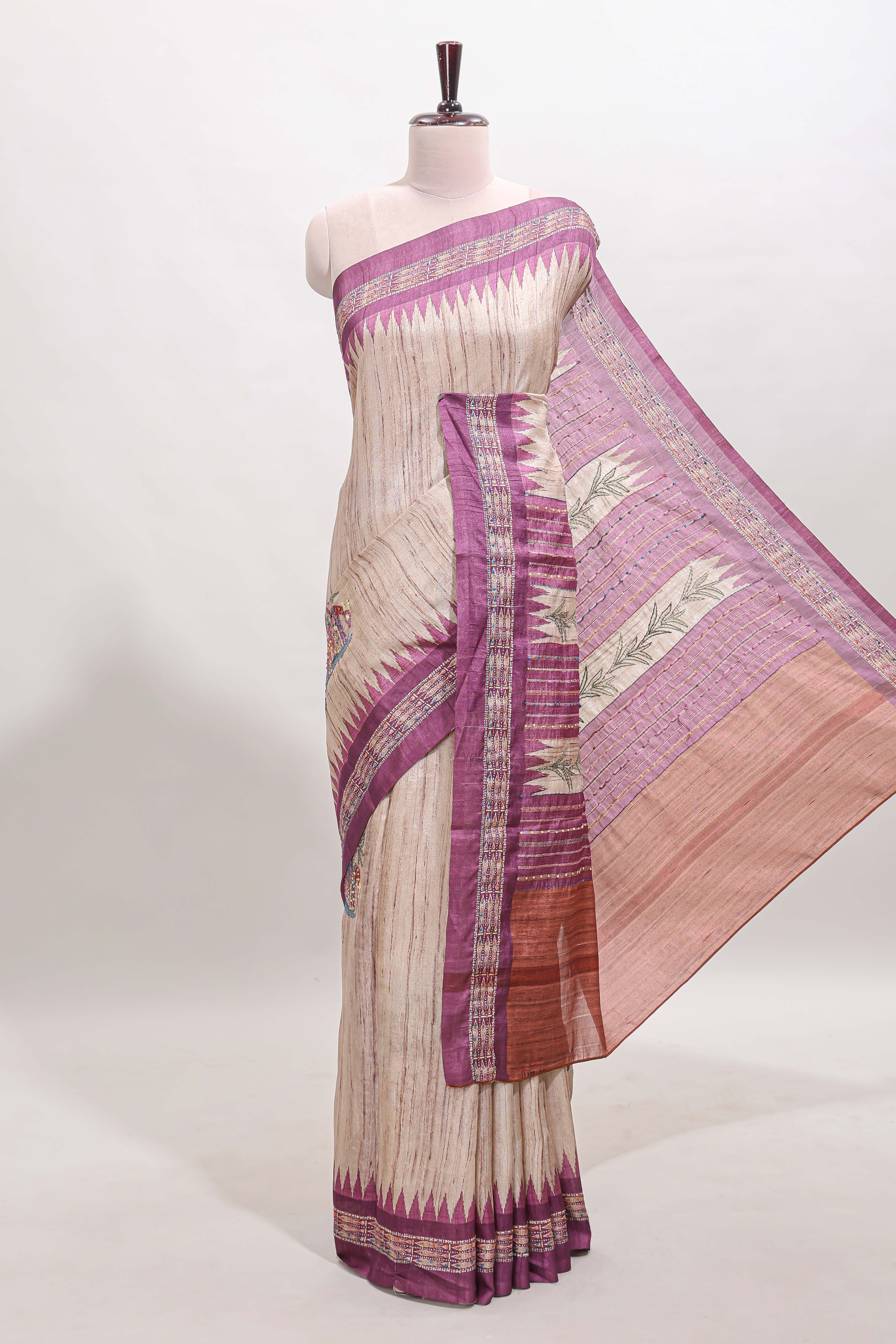 Tussar saree in beige tone delicate floral embroidery featuring violet borders and woven pallu along with contrast blouse