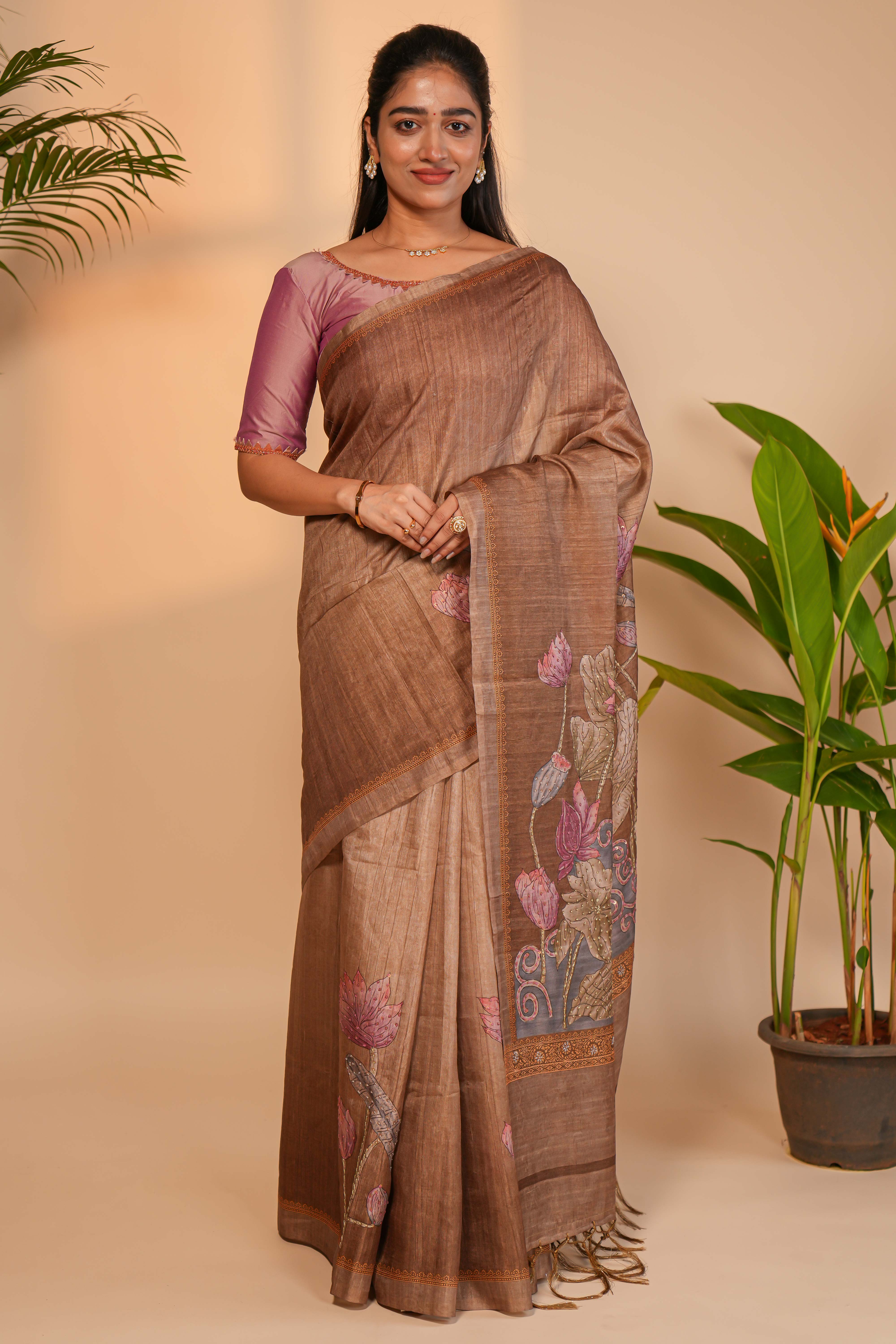 Brown floral design semi tussar saree with self border and matching printed blouse