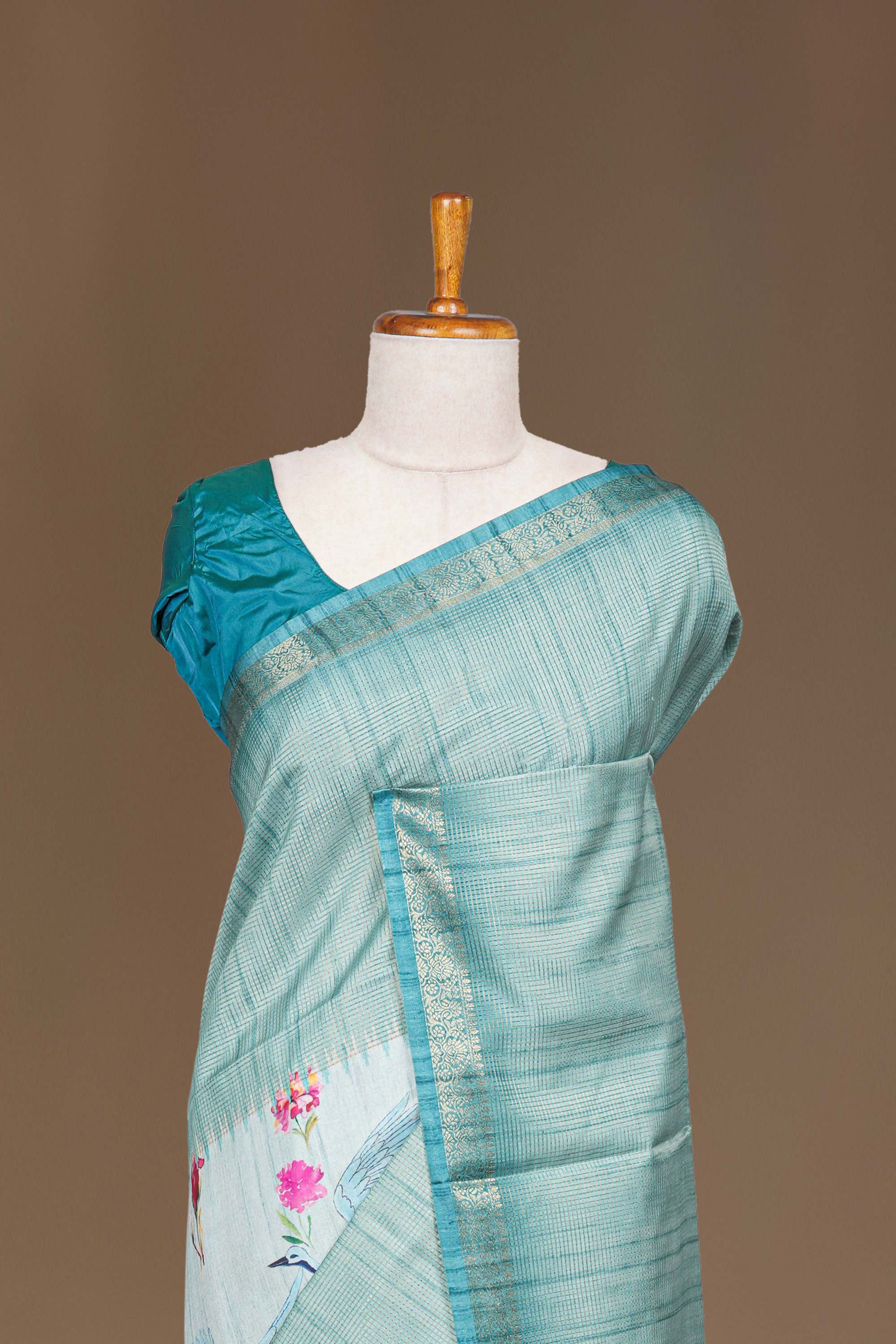 Teal Blue Art Tussar Saree Centre Floral Print Across The Body With Zari Stripes Pallu