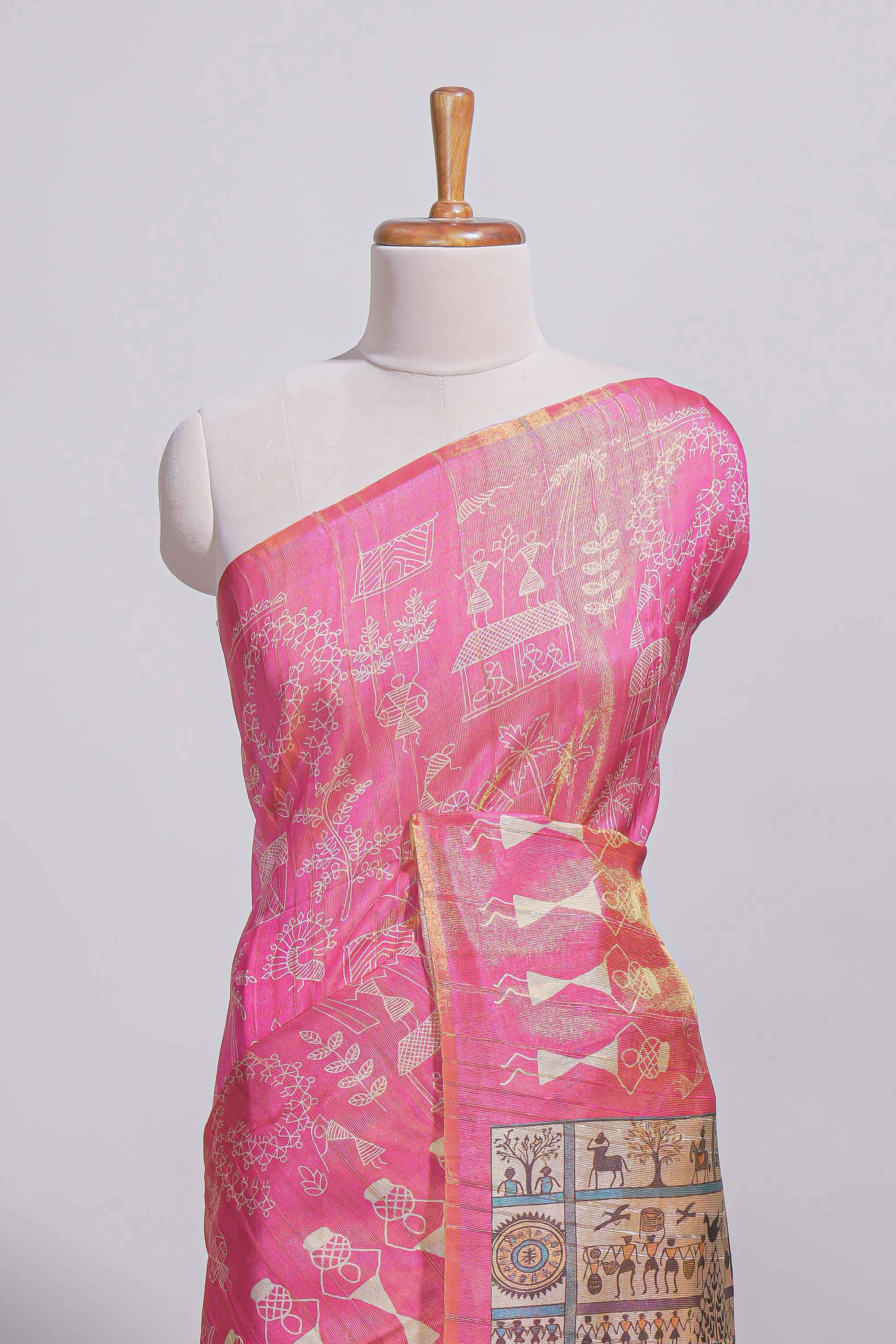 Bright pink warli printed semi tussar sareewith contrast warli printed pallu and matching blouse
