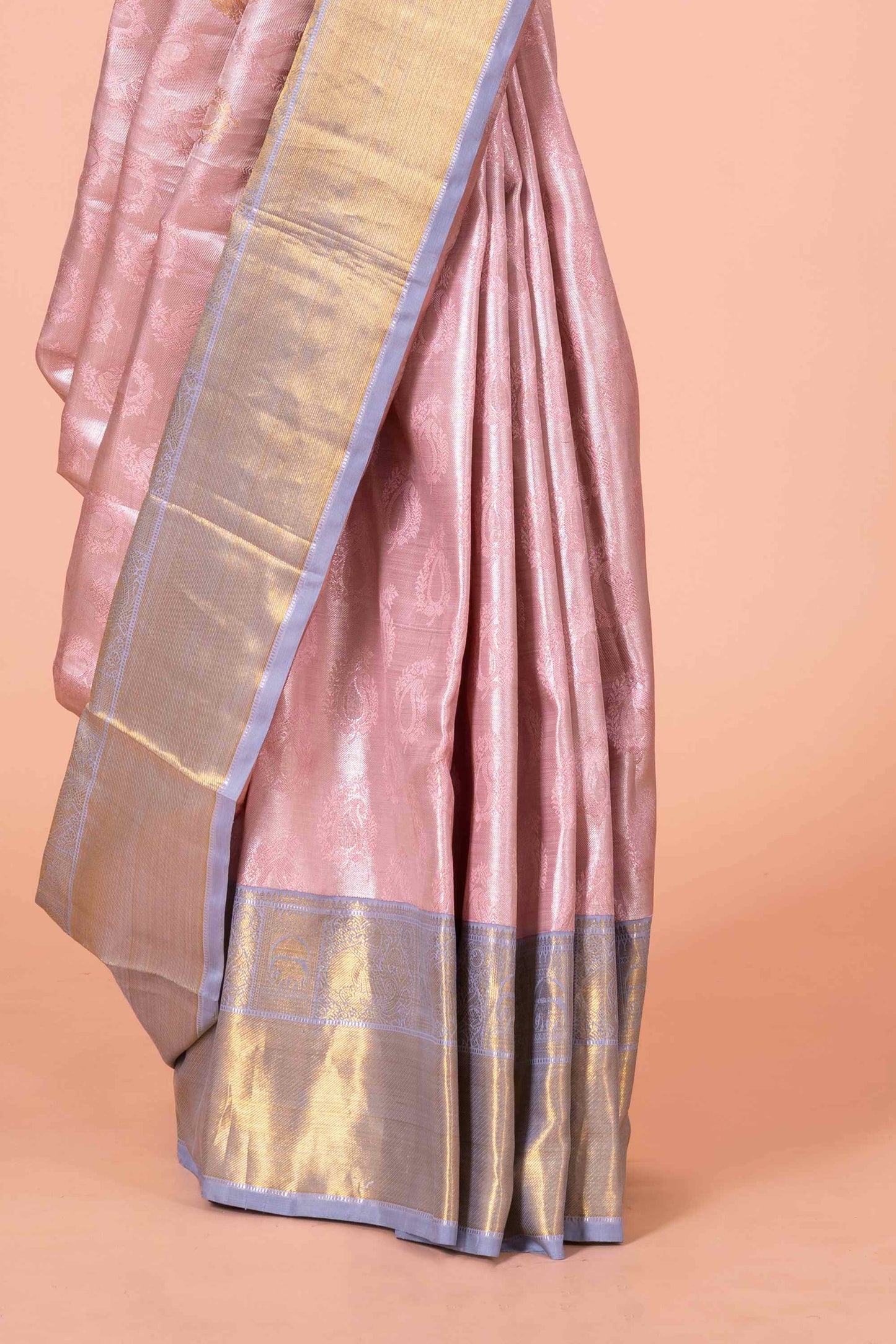Pastel Pink Tissue Kancheepuram Pattu With Silver Zari Border And Elegant Pallu Design