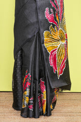 Black south cotton Saree With Multi Color Orchid Printed Across The Body Along With White Dotted Blouse