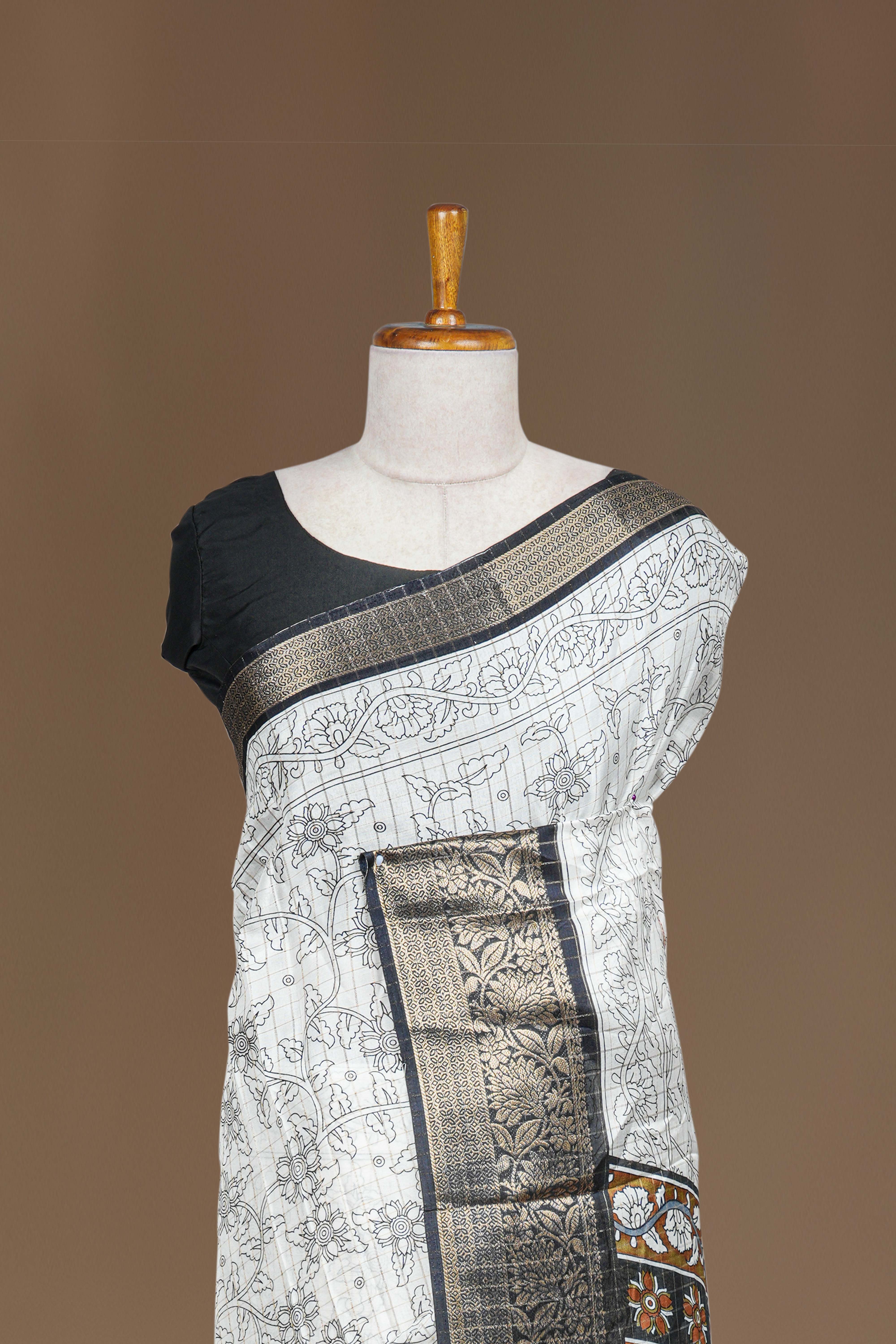 Dola Silk Saree Pen Kalamkari Print Across The Body With Contrast Floral Zari Weaving Border Along With Zari Stripes Blouse
