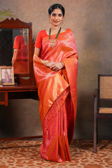 Orange colour Semi Soft Silk Saree with intricate gold zari floral vine weaving patterns and Rich zari woven pallu with Matching blouse