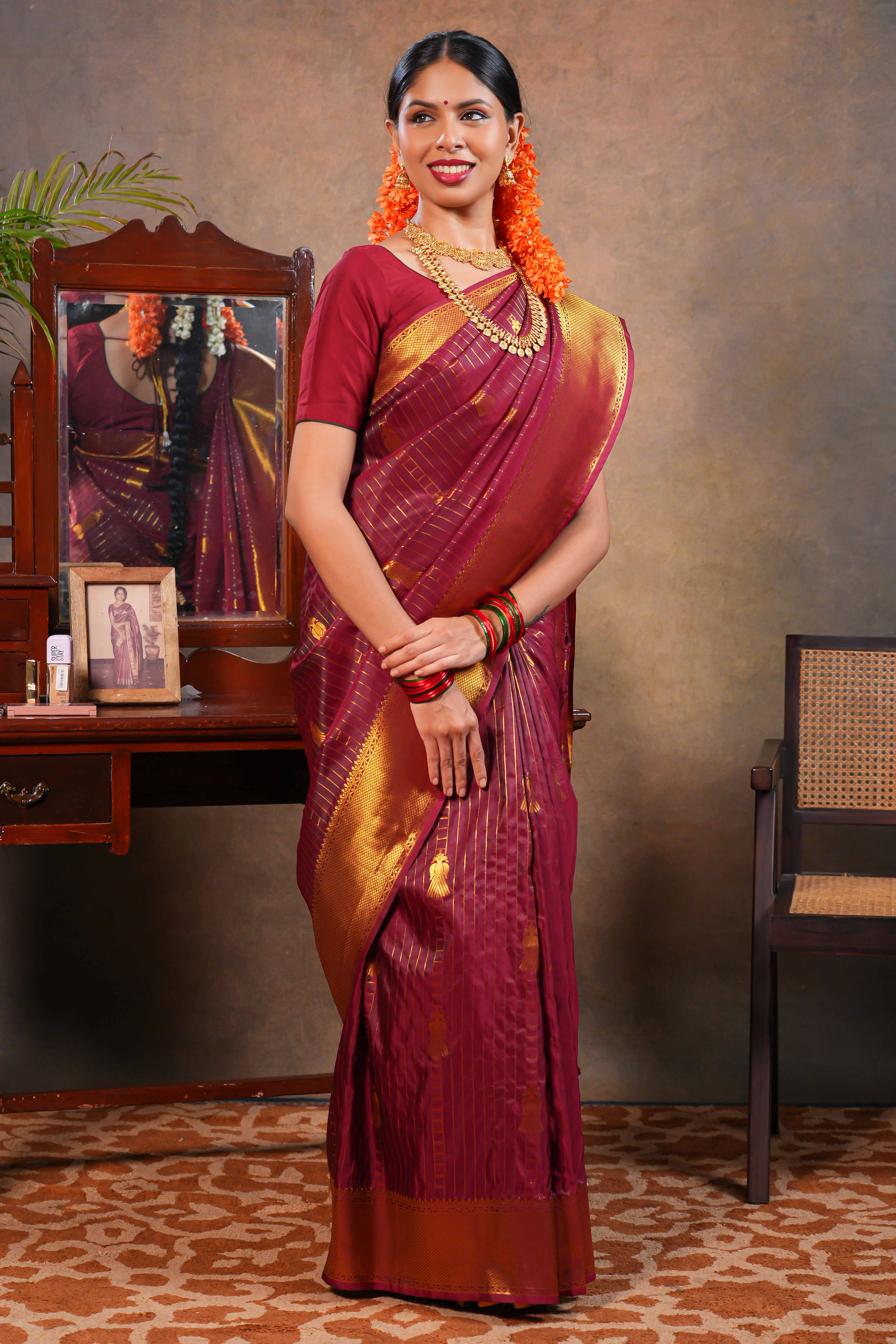 Red Maroon Semi soft Silk Saree Gold Zari Lines and Peacock ButtaswithZari Border and Matching Blouse
