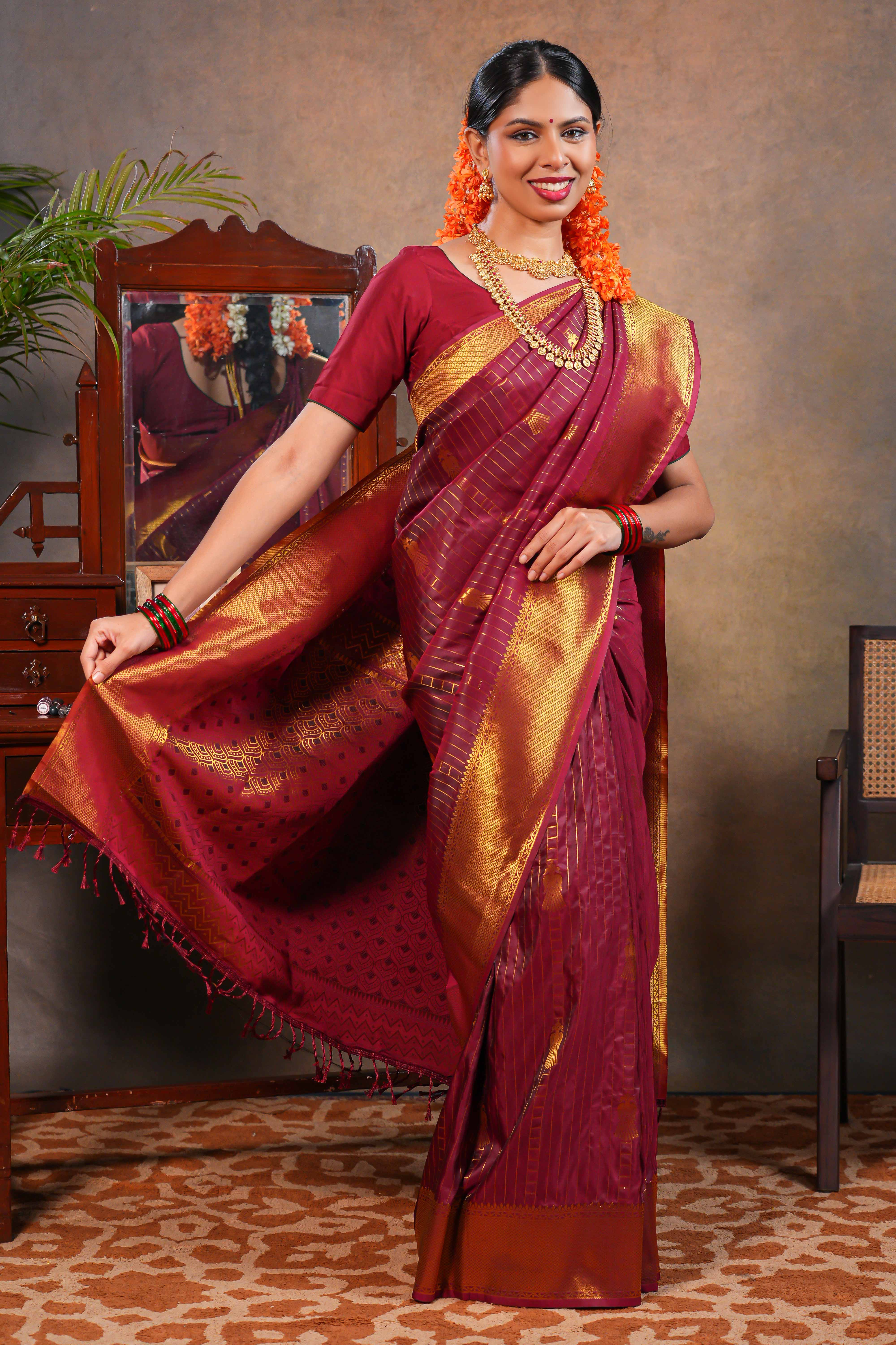 Red Maroon Semi soft Silk Saree Gold Zari Lines and Peacock ButtaswithZari Border and Matching Blouse