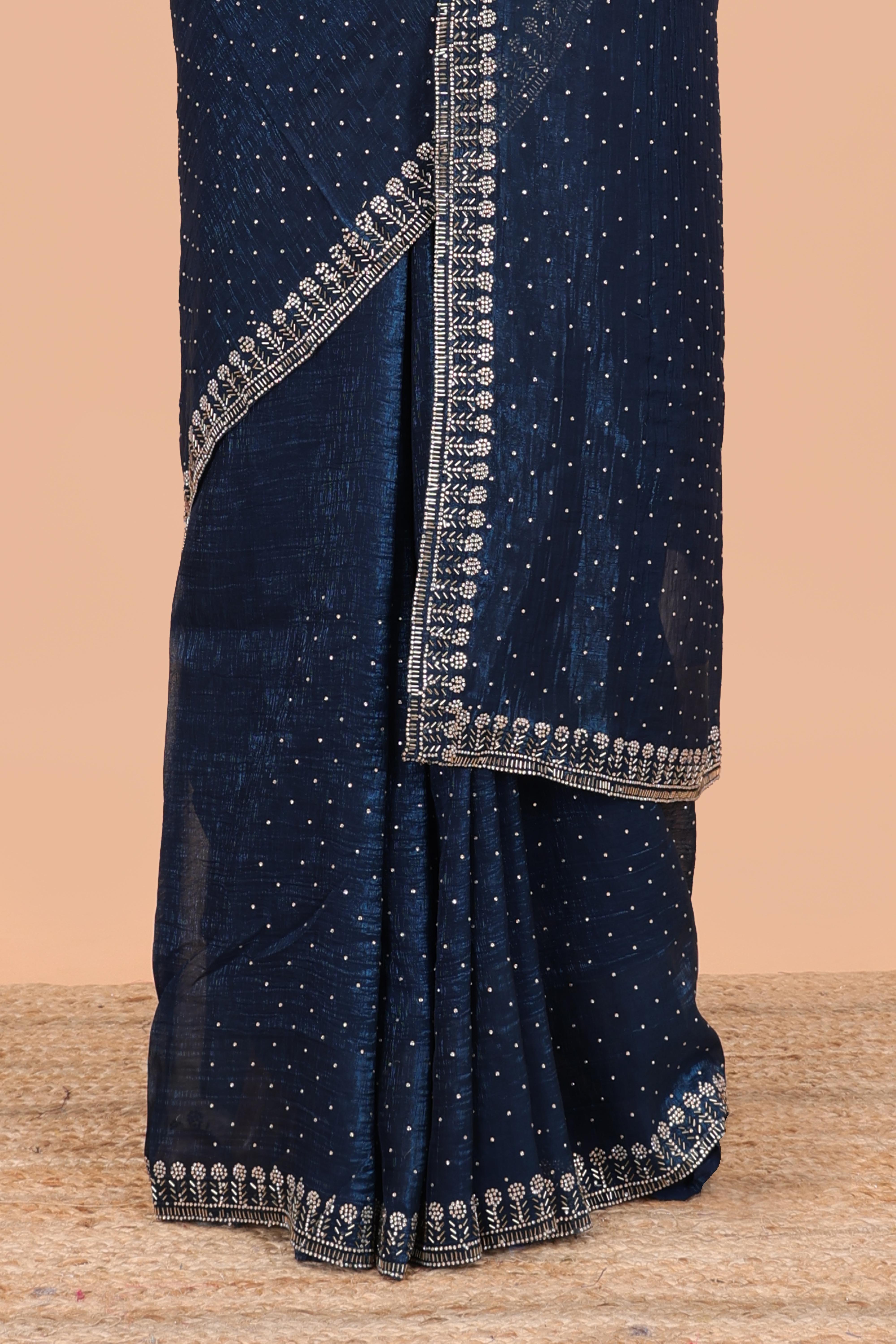 Blue designer georgette space silk saree with heavy stone & beads work, short pallu & contrast sequin embroidered blouse